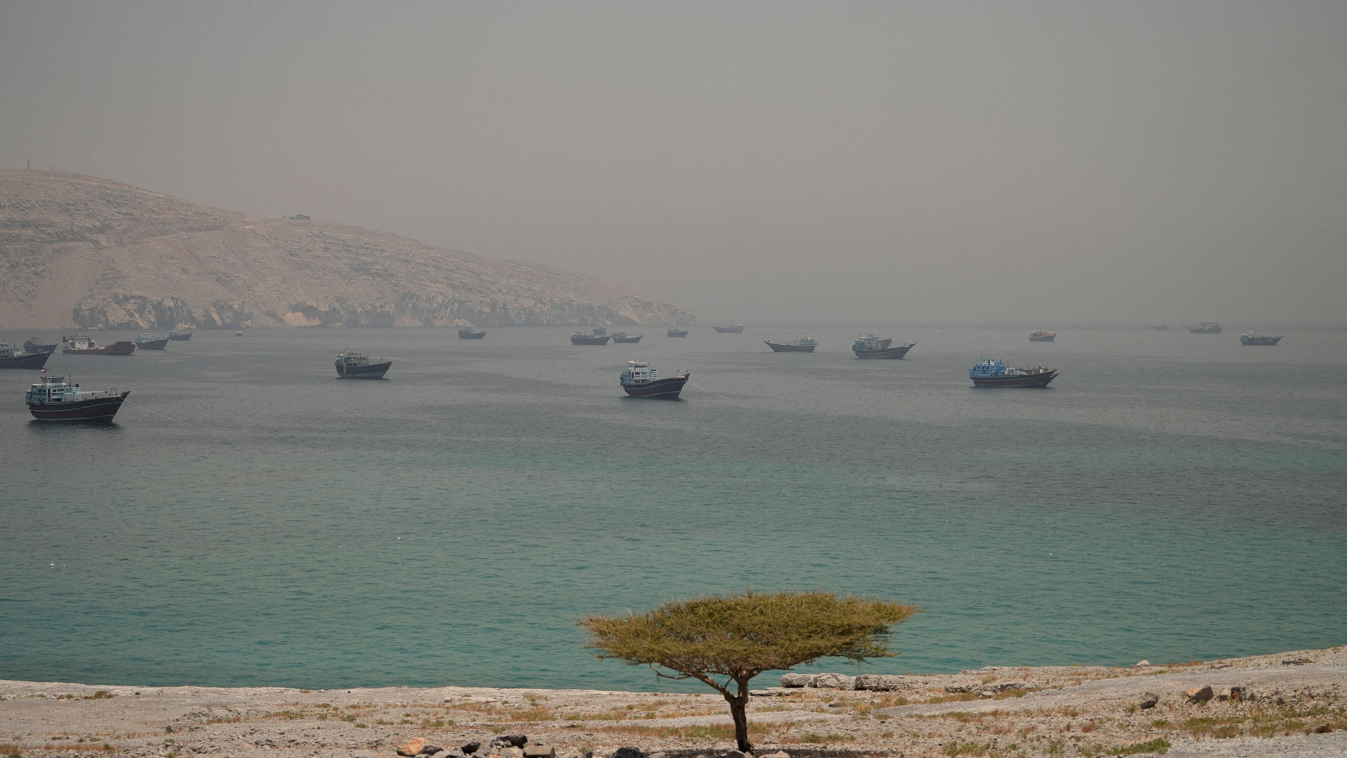 Vessels are anchored in the Strait of Hormuz, as seen from Musandam, Oman, June 11, 2026. REUTERS/Stringer