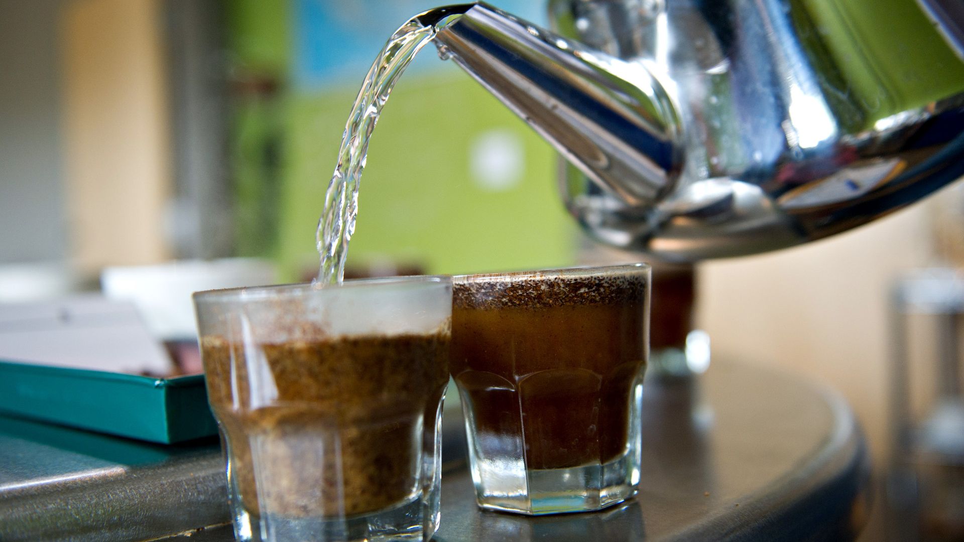 Hot water poured in coffee cups 