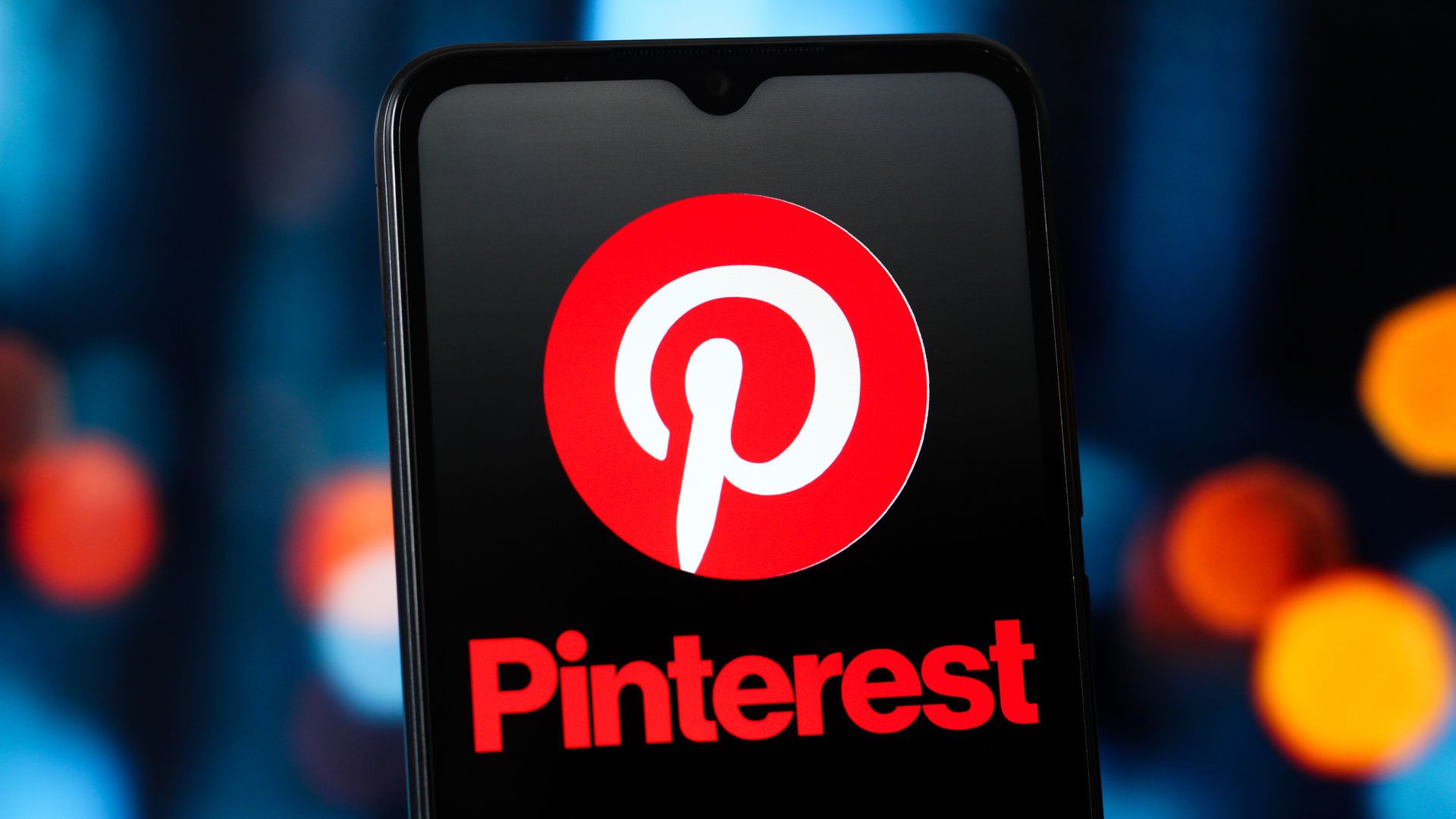 In this photo illustration, the Pinterest logo is seen displayed on a smartphone screen.