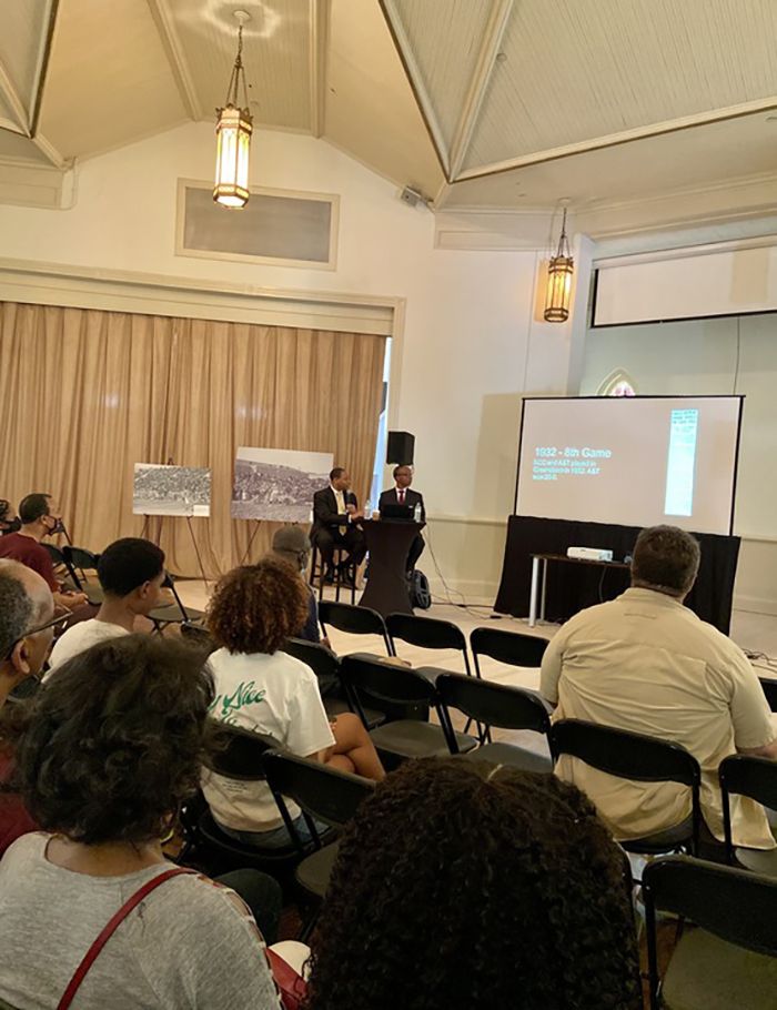 Professors Arwin Smallwood of A&T and Charles Johnson of Central discussed the 100-year football rivalry. Photo: Ashley Mahoney/Axios 