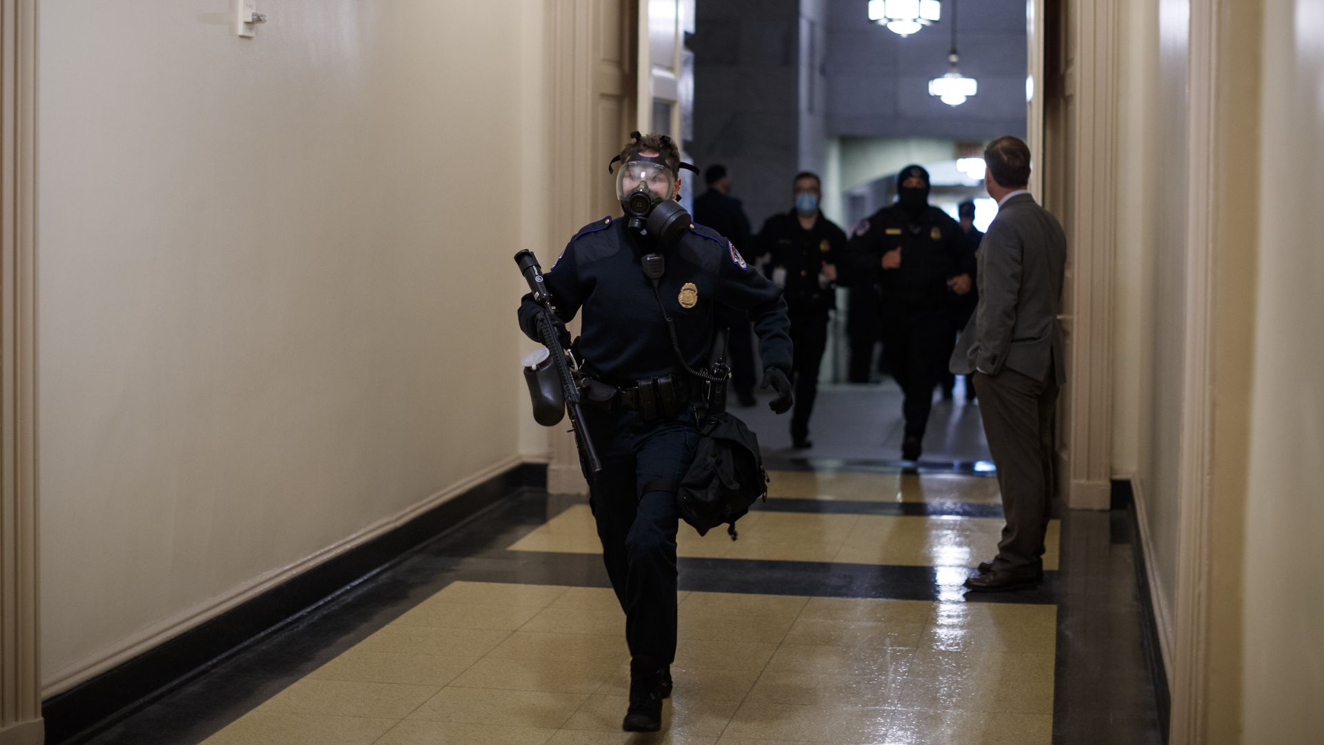 Members of the U.S. Capitol Police rush to respond to rioters on Jan. 6, 2021.