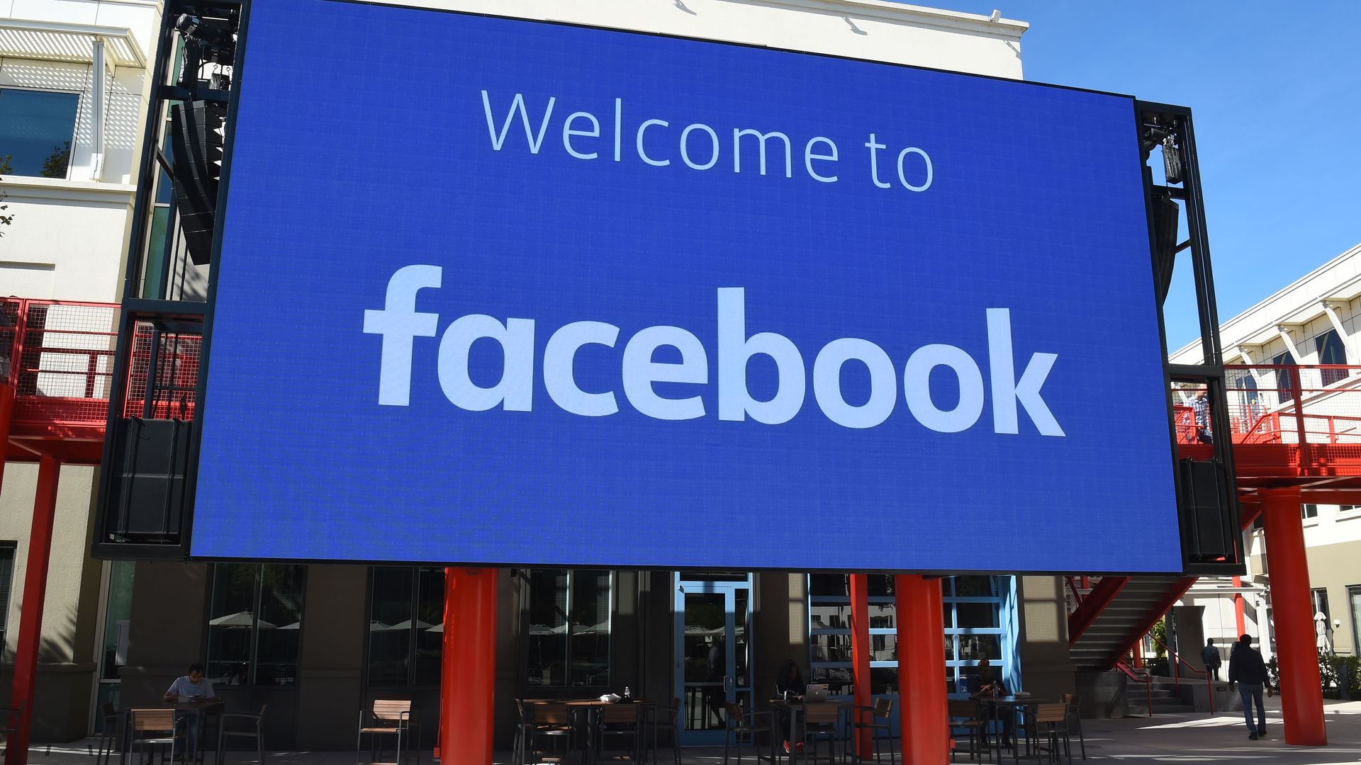 A sign that reads "welcome to facebook."