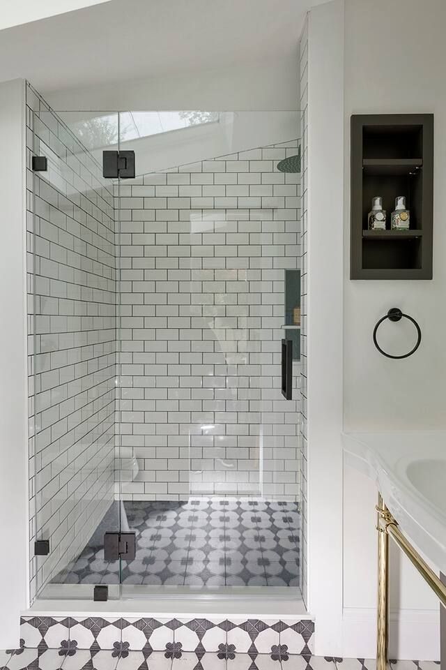 White tiled shower.