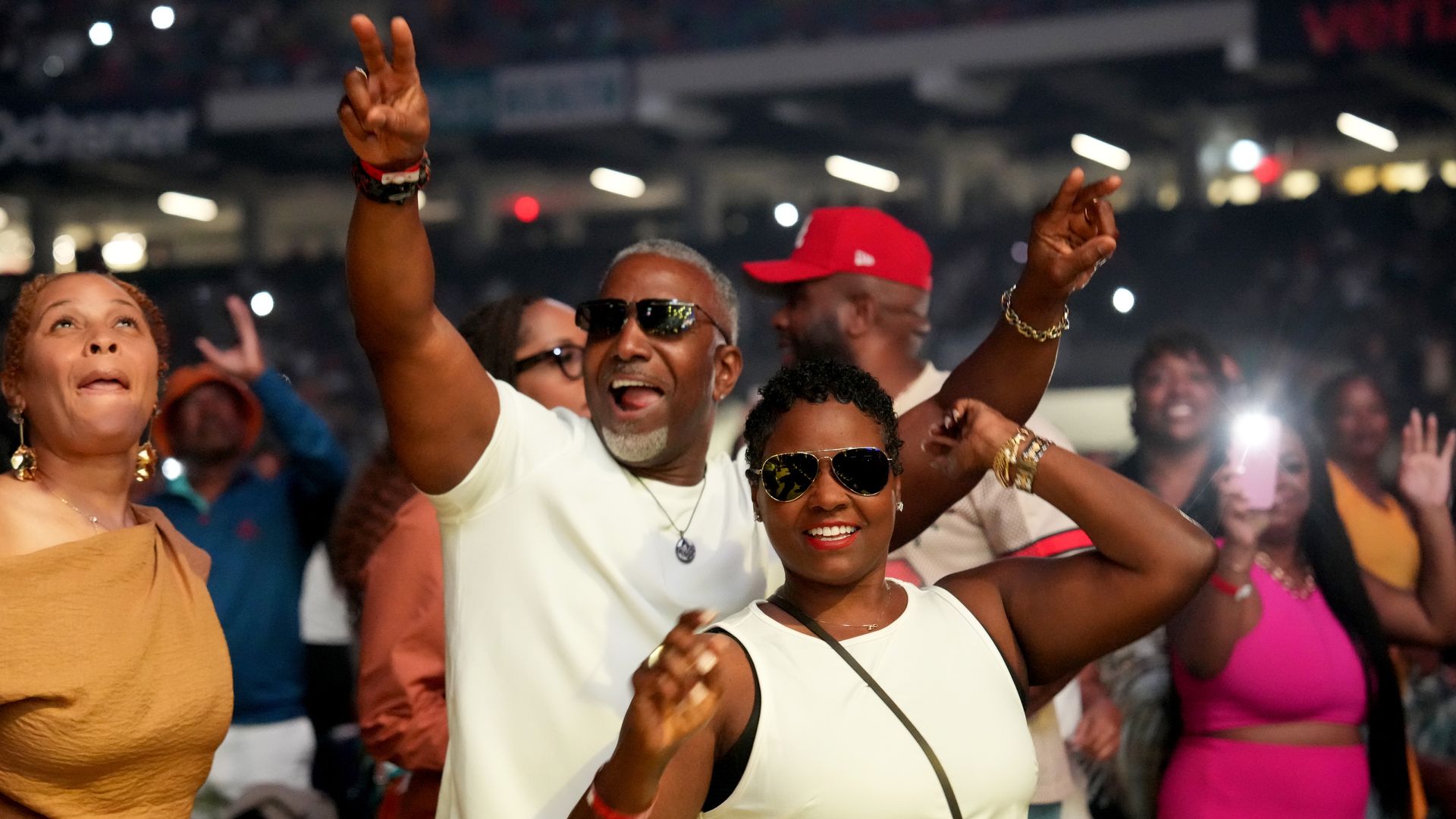 A couple dances together inside the Superdome.