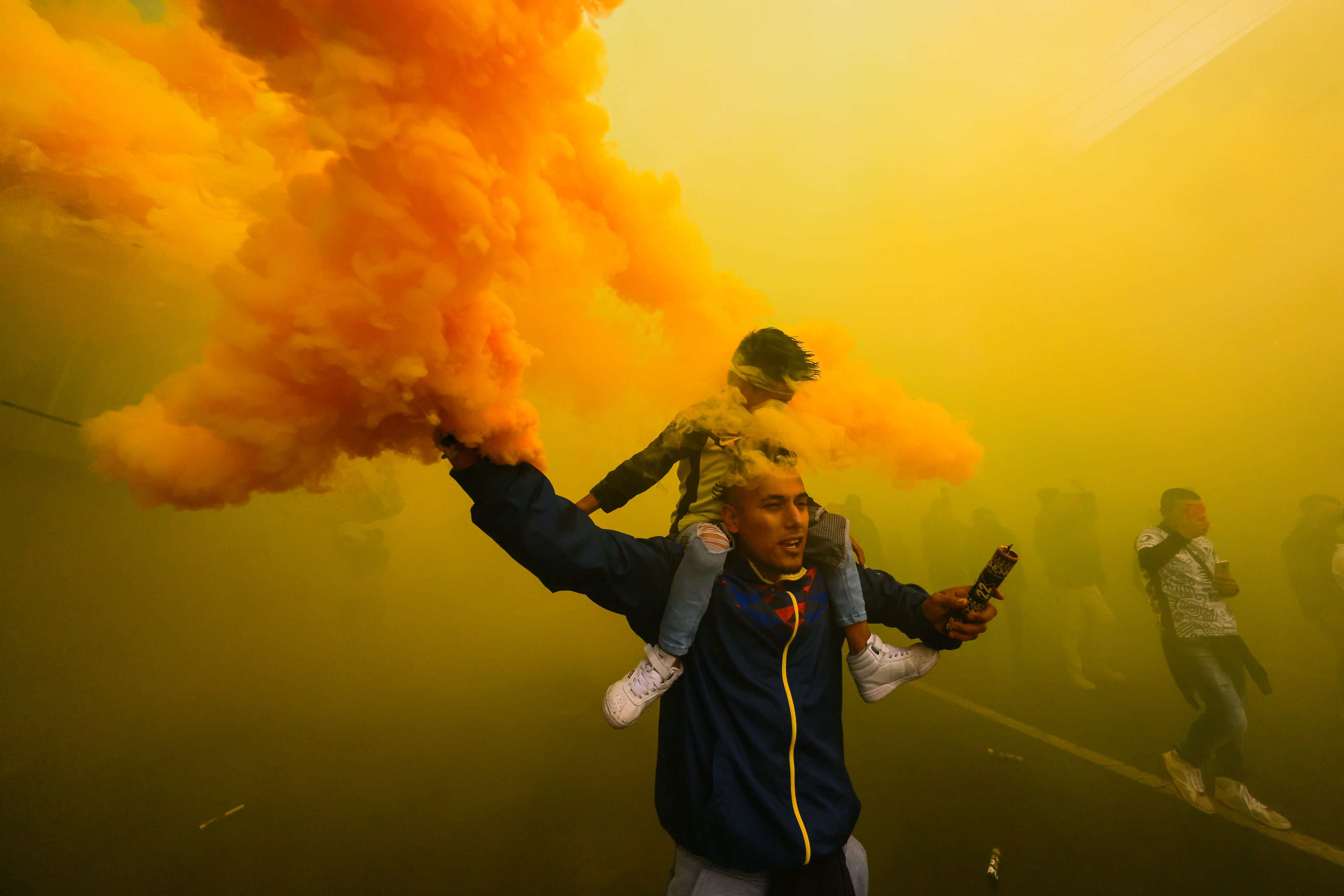 Mexican soccer fans with flares