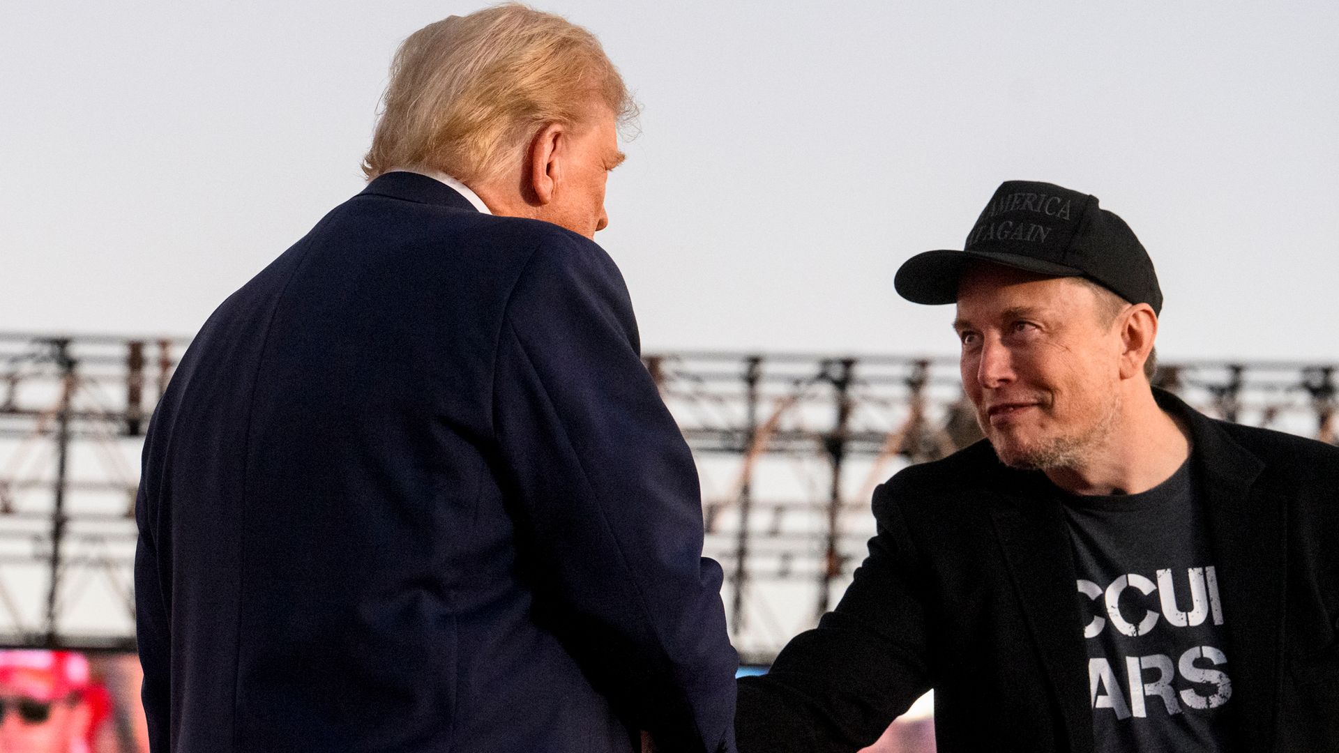  Elon Musk, chief executive officer of Tesla Inc., right, and former US President Donald Trump during a campaign event at the Butler Farm Show in Butler, Pennsylvania, US, on Saturday, Oct. 5, 2024.