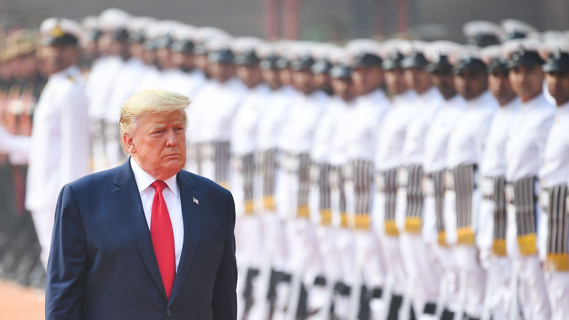 President Trump reviews a guard of honour during a ceremonial reception at Rashtrapati Bhavan