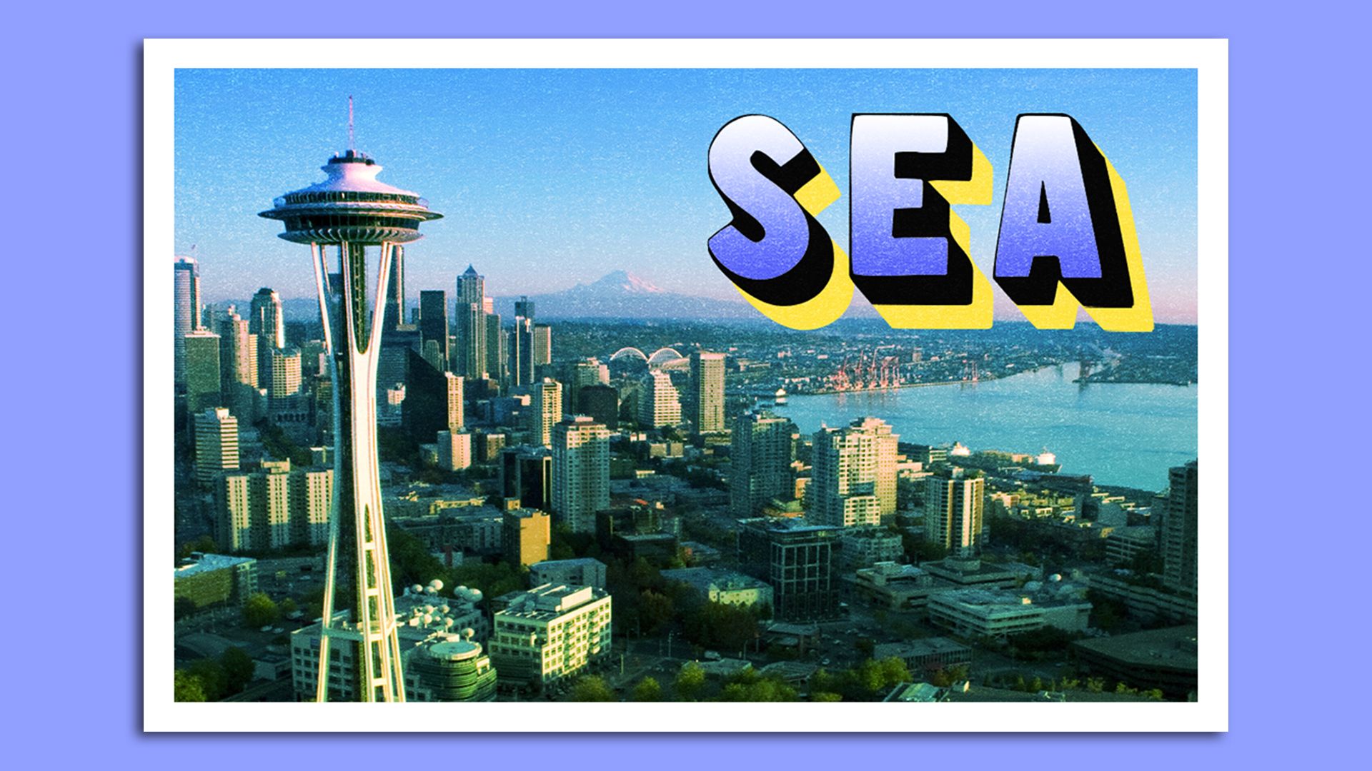 A postcard of Seattle from an aerial view, looking toward downtown and with Eliott Bay on the right. 