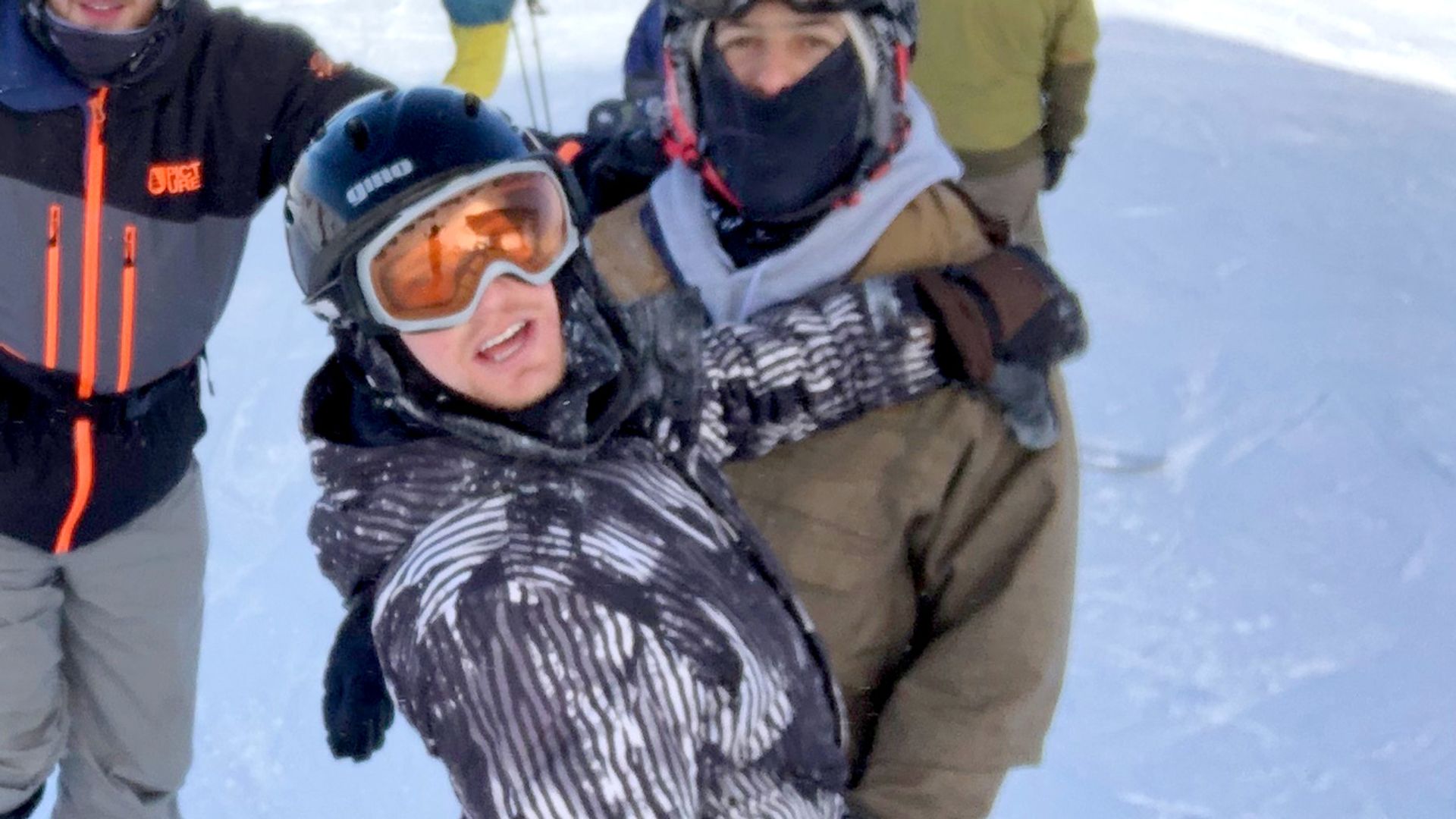 A photo of Sam Tabachnik posing for a photo on a ski mountain. 