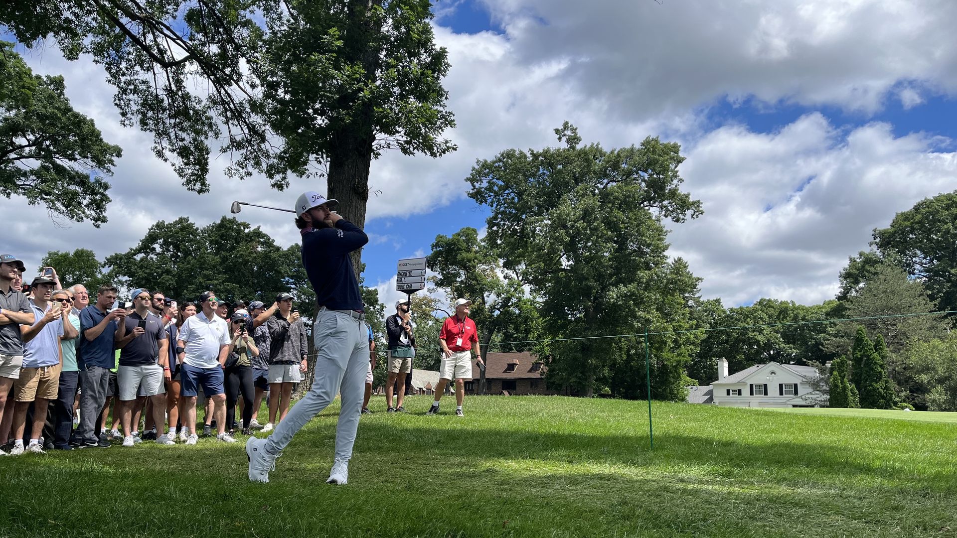 Cameron Young, the world's No. 23 golfer, watches his ball flight on the 8th hole yesterday. Photos: Joe Guillen/Axios