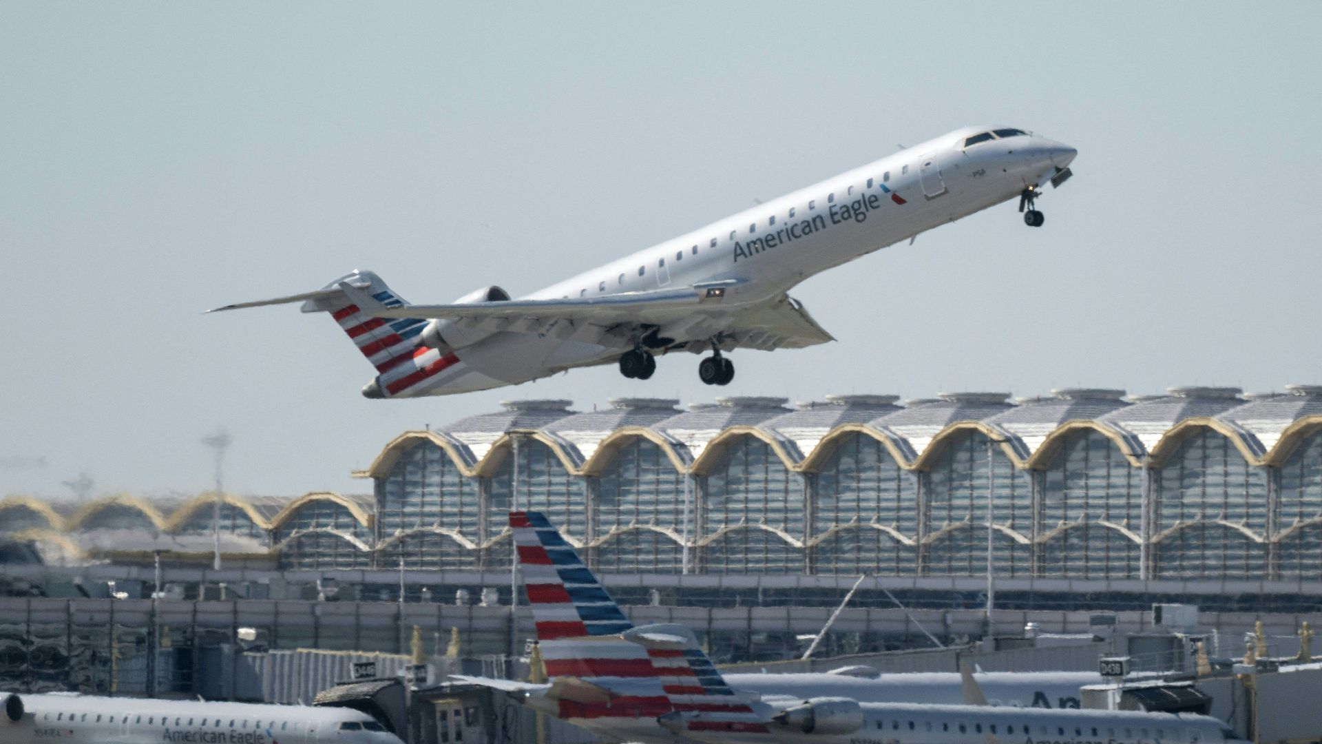 Photo of an American Airlines aircraft taking off from an airport
