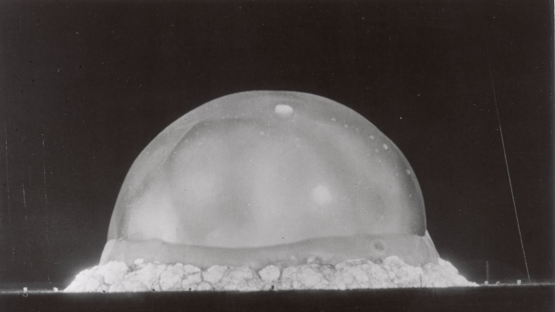 A mushroom cloud for the atomic bomb at the Trinity Test in New Mexico.