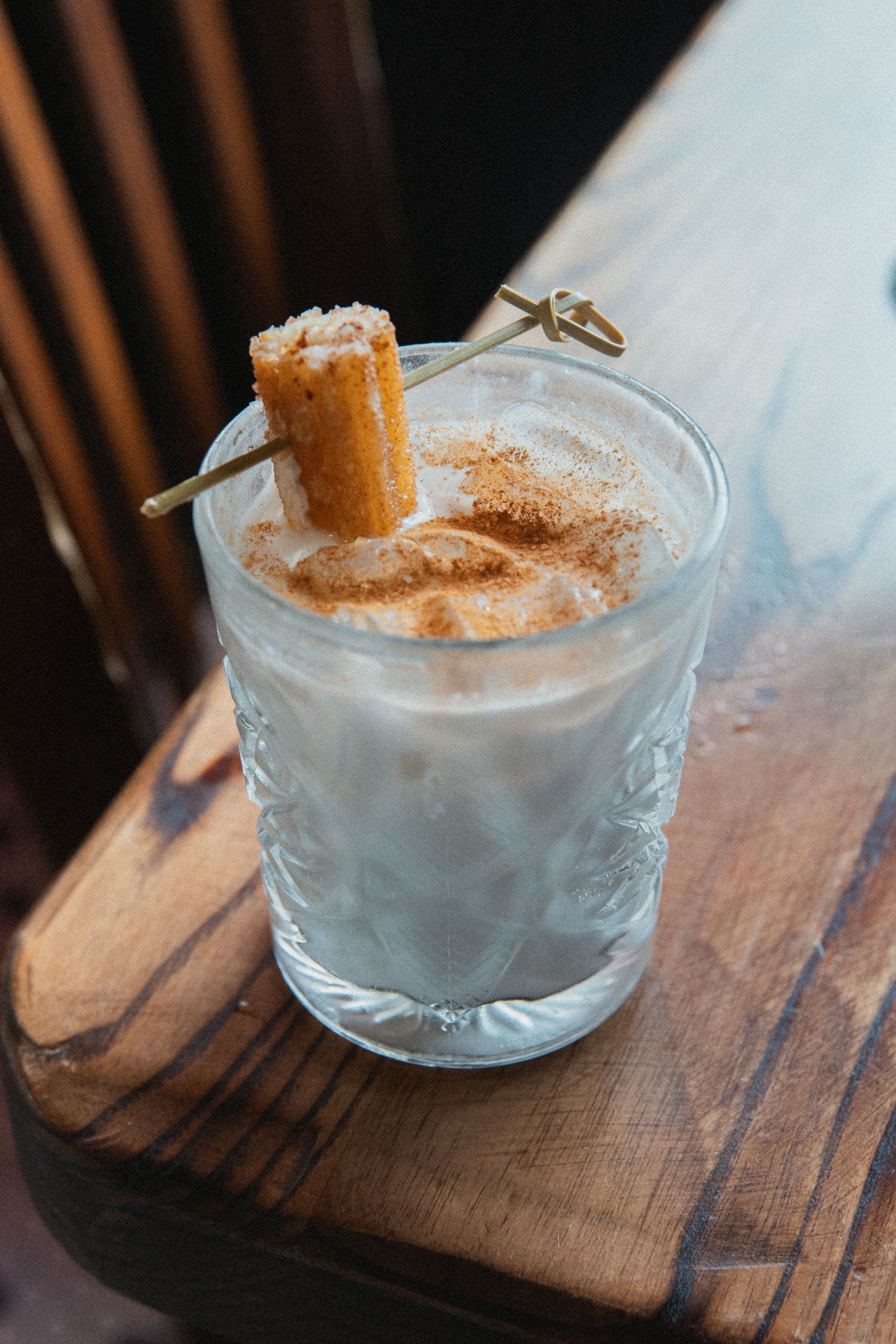 cocktail with a churro 