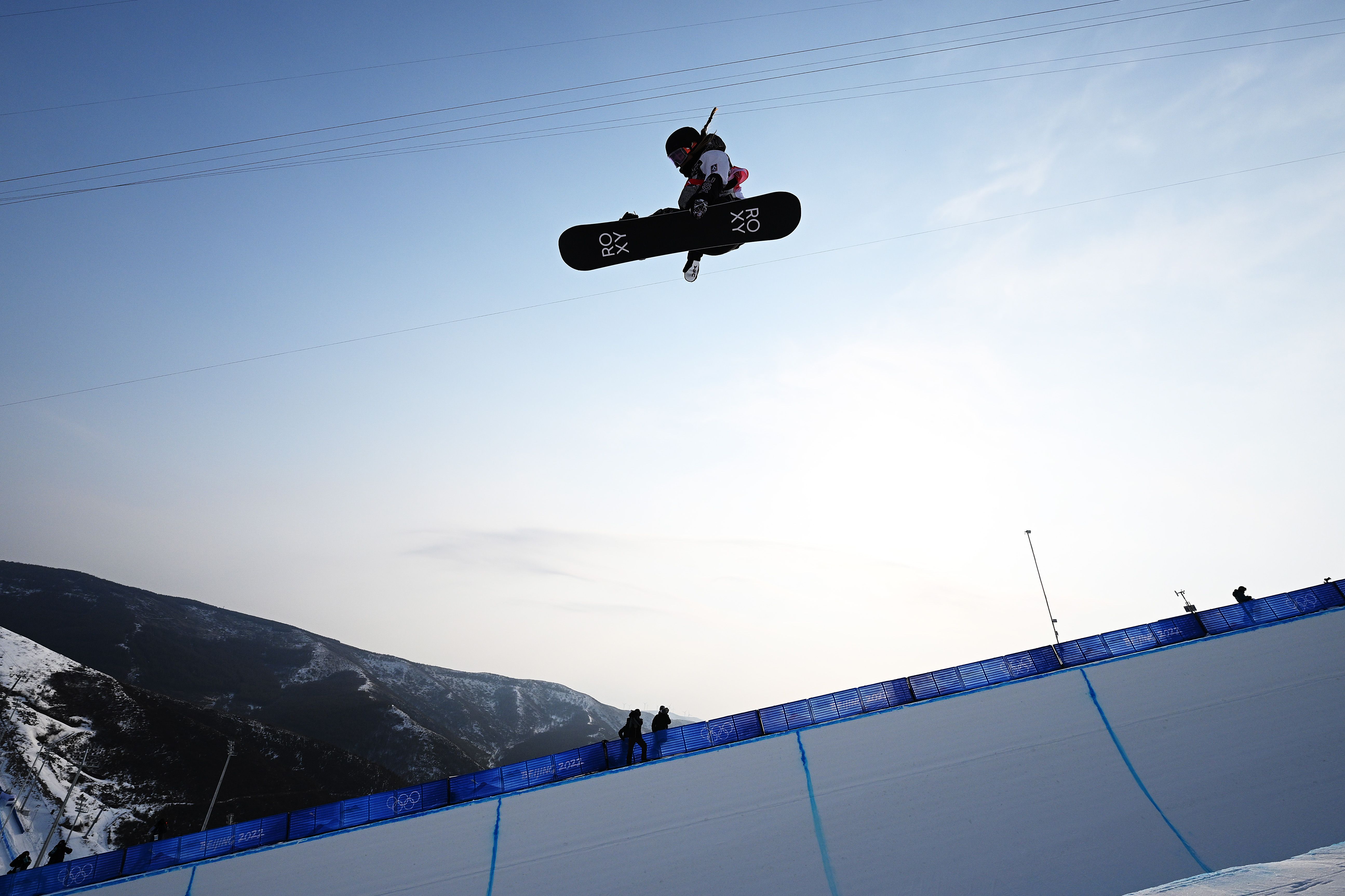Chloe Kim of United States performs a trick during the Women's Snowboard Halfpipe Qualification on Day 5 of the inter Olympic Games on February 09, 2022 in Zhangjiakou, China. 