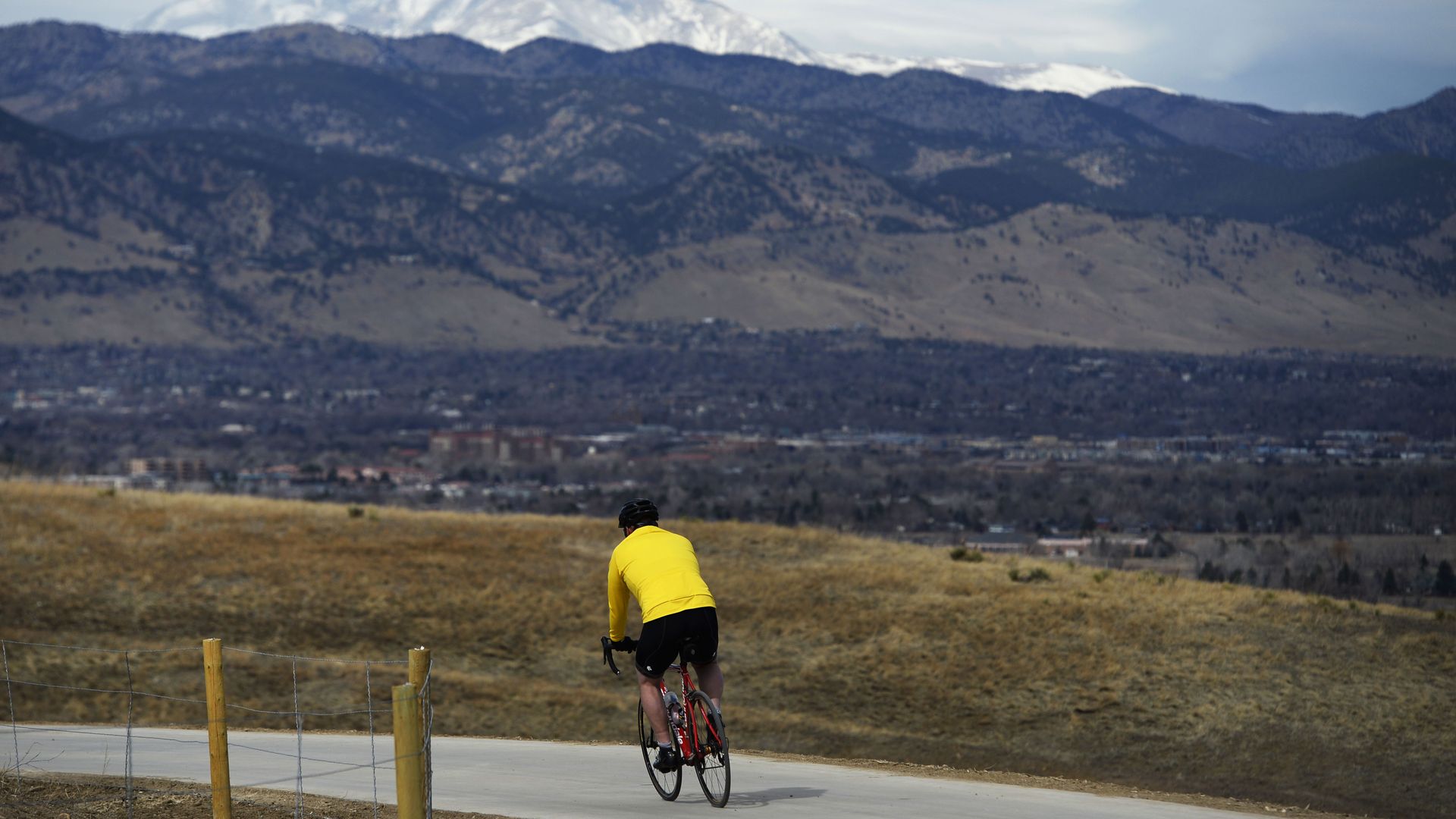 A cyclist makes his way down into Boulder along the U.S. 36 bikeway. 