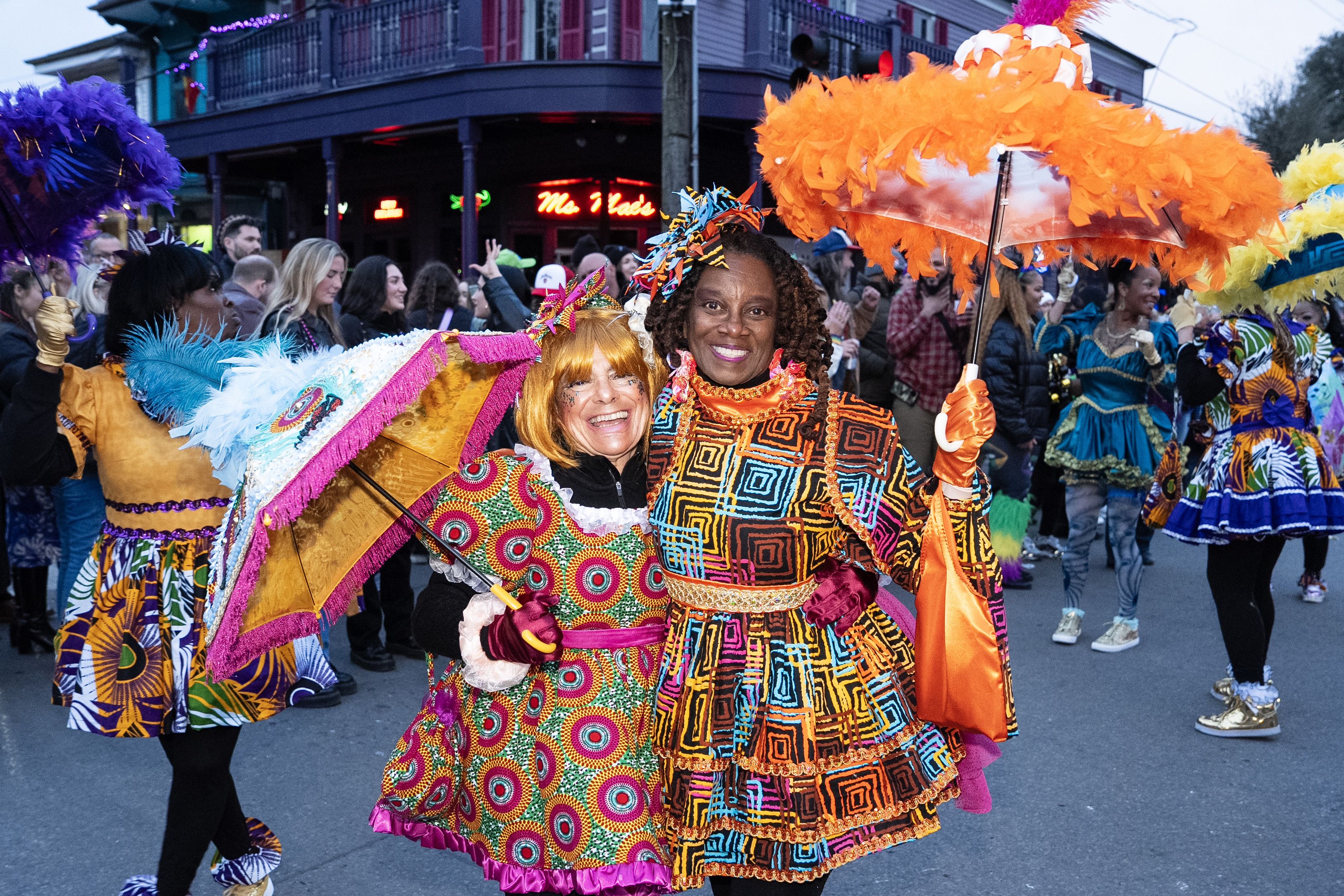 Photo shows two women parading as baby dolls.