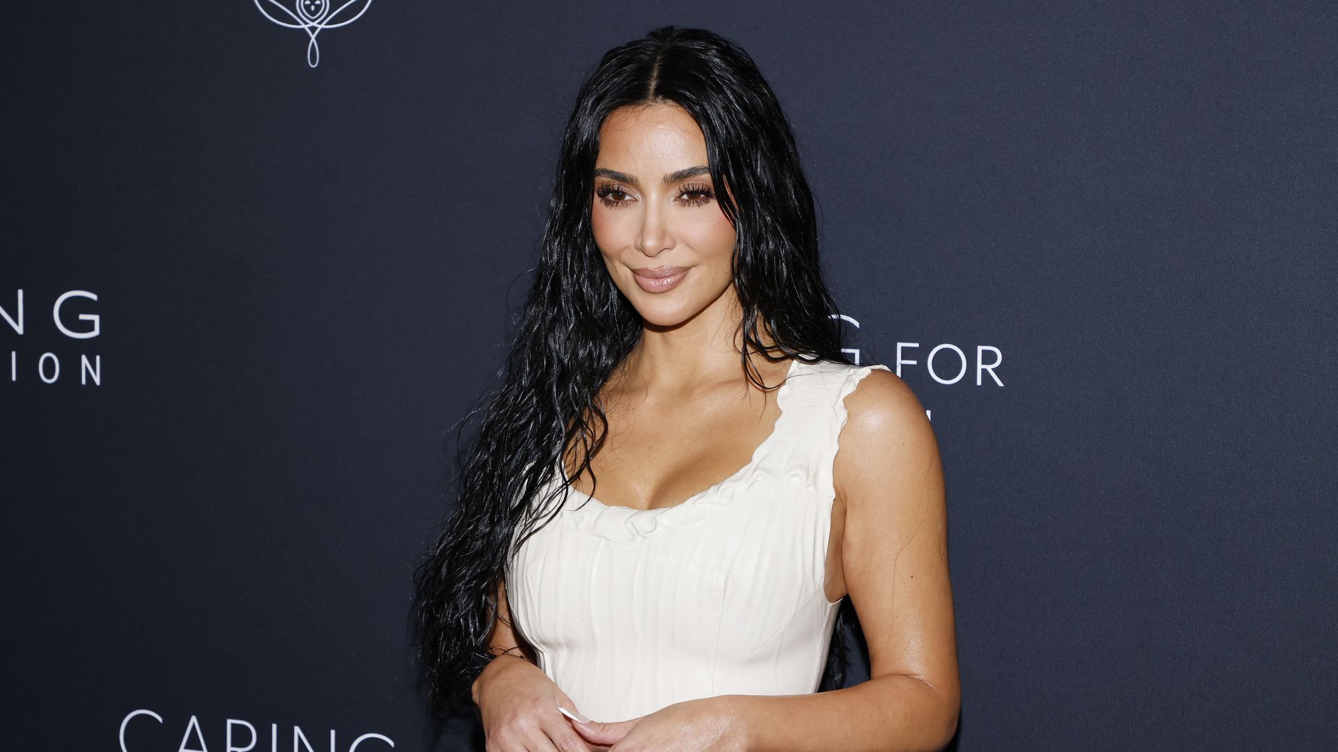 Kim Kardashian on the red carpet at a charity event
