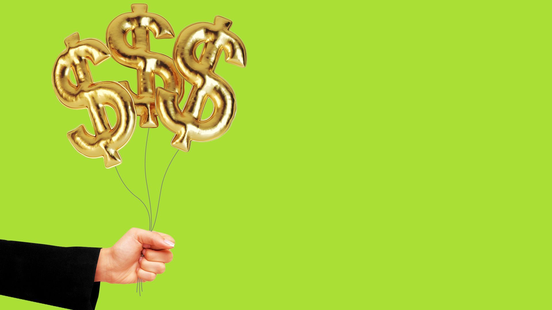 Someone holding balloons shaped like dollar signs
