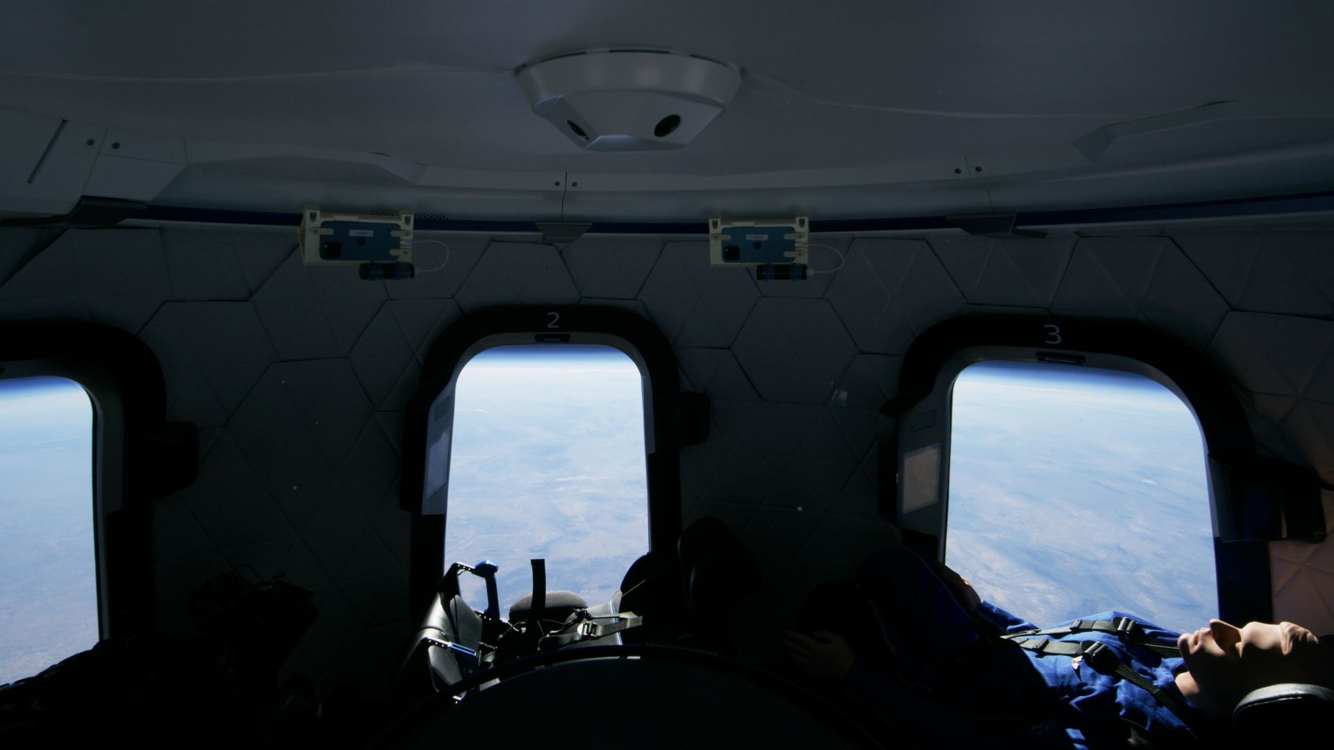 A test dummy flies to suborbital space with a view of Earth out the window