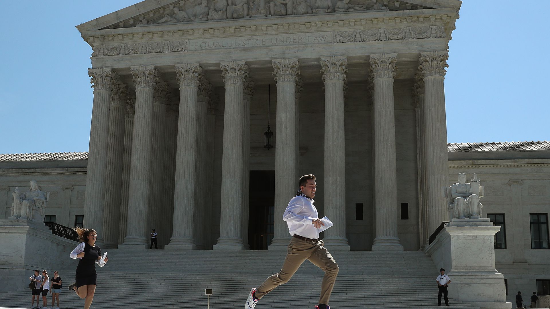 Interns running outside Supreme Court