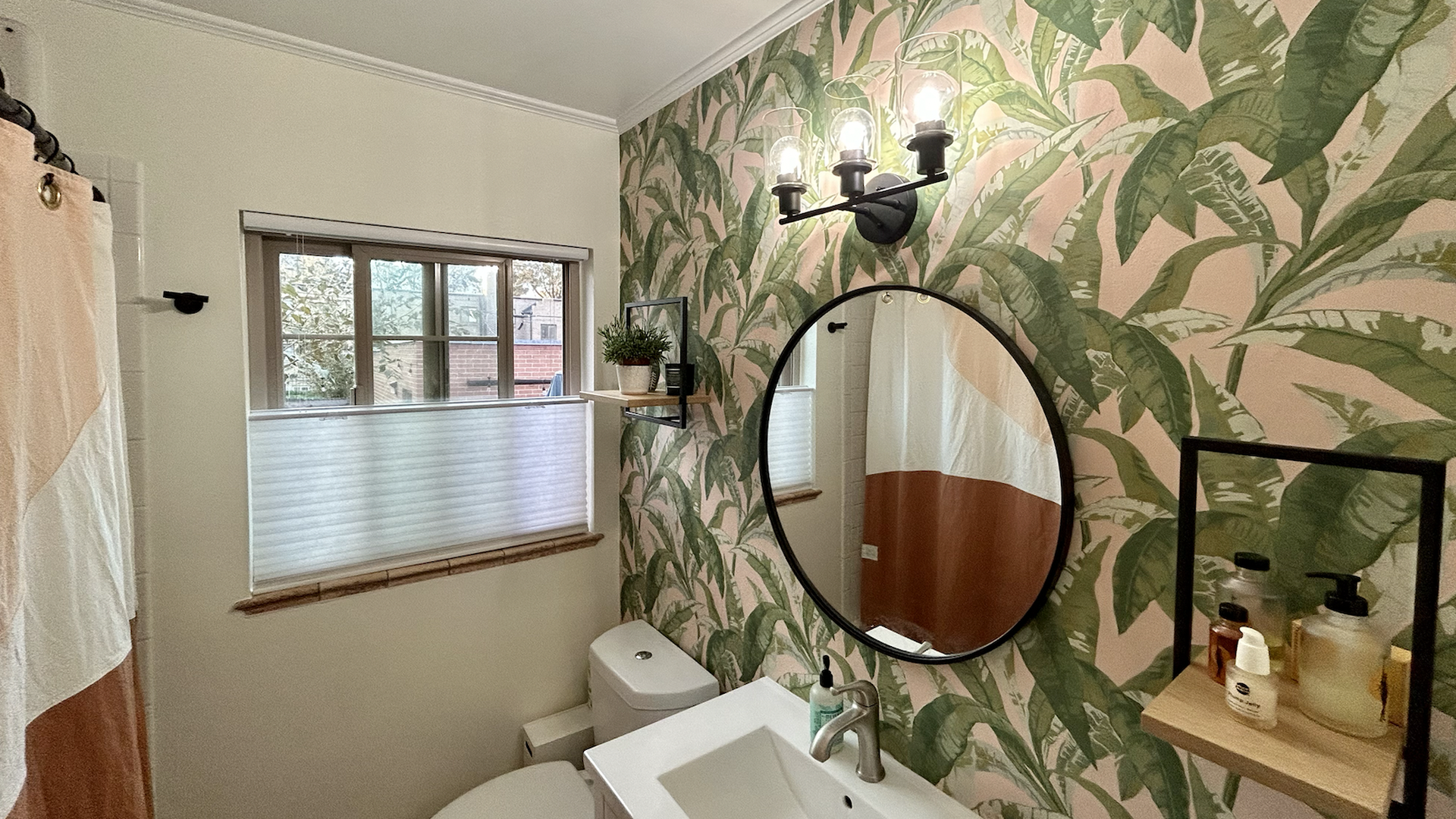 bathroom with wallpaper