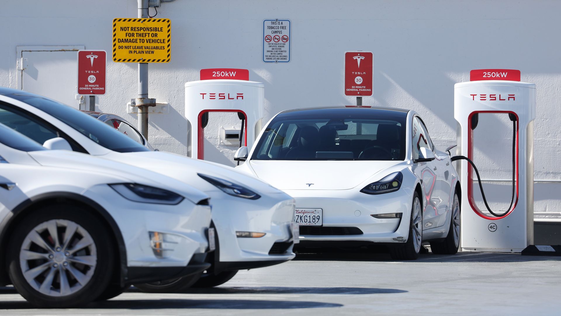 A row of Teslas is seen charging in San Francisco.