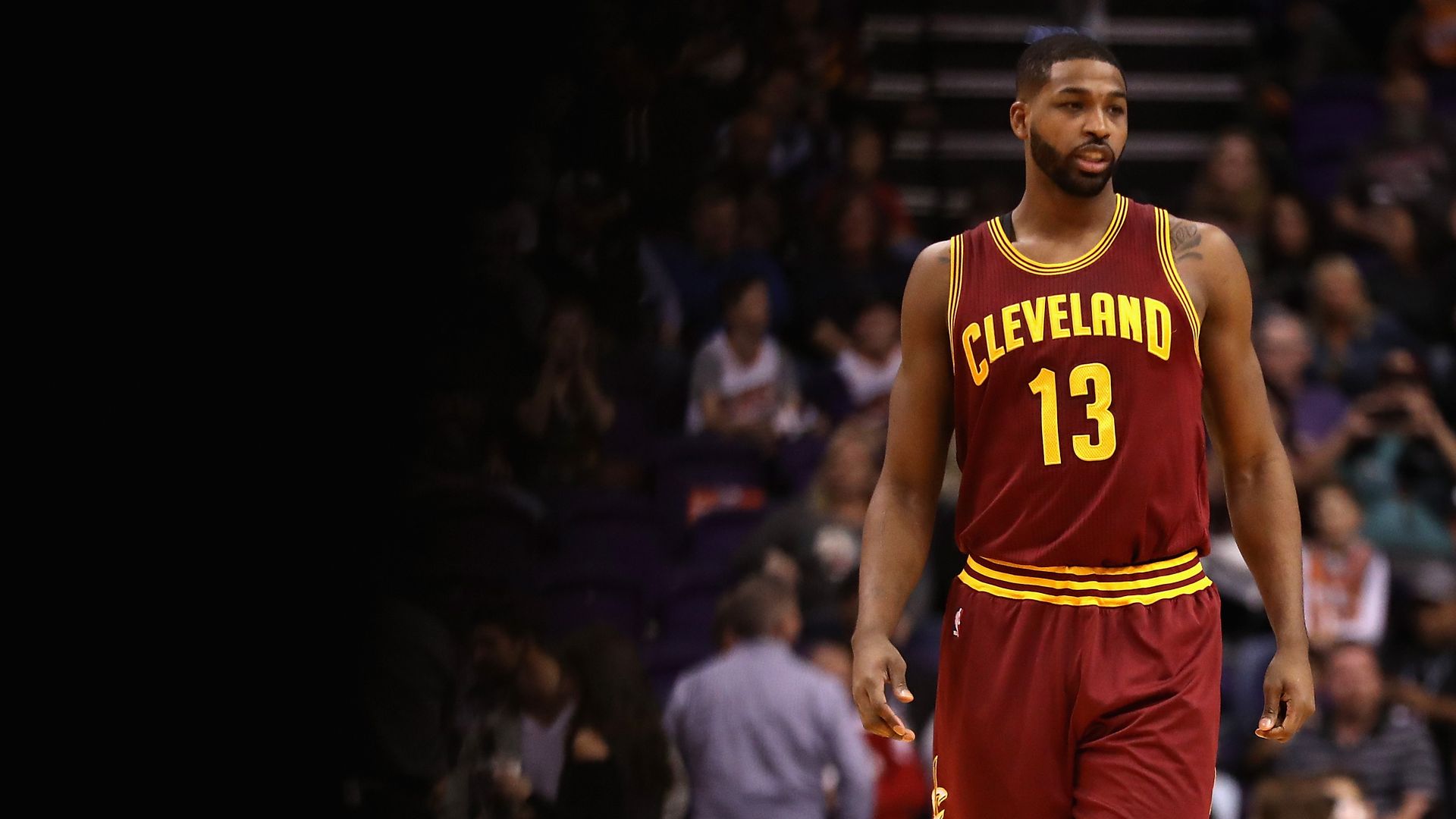 The Cavs' Tristan Thompson, in wine-colored uniform, during a game in 2017