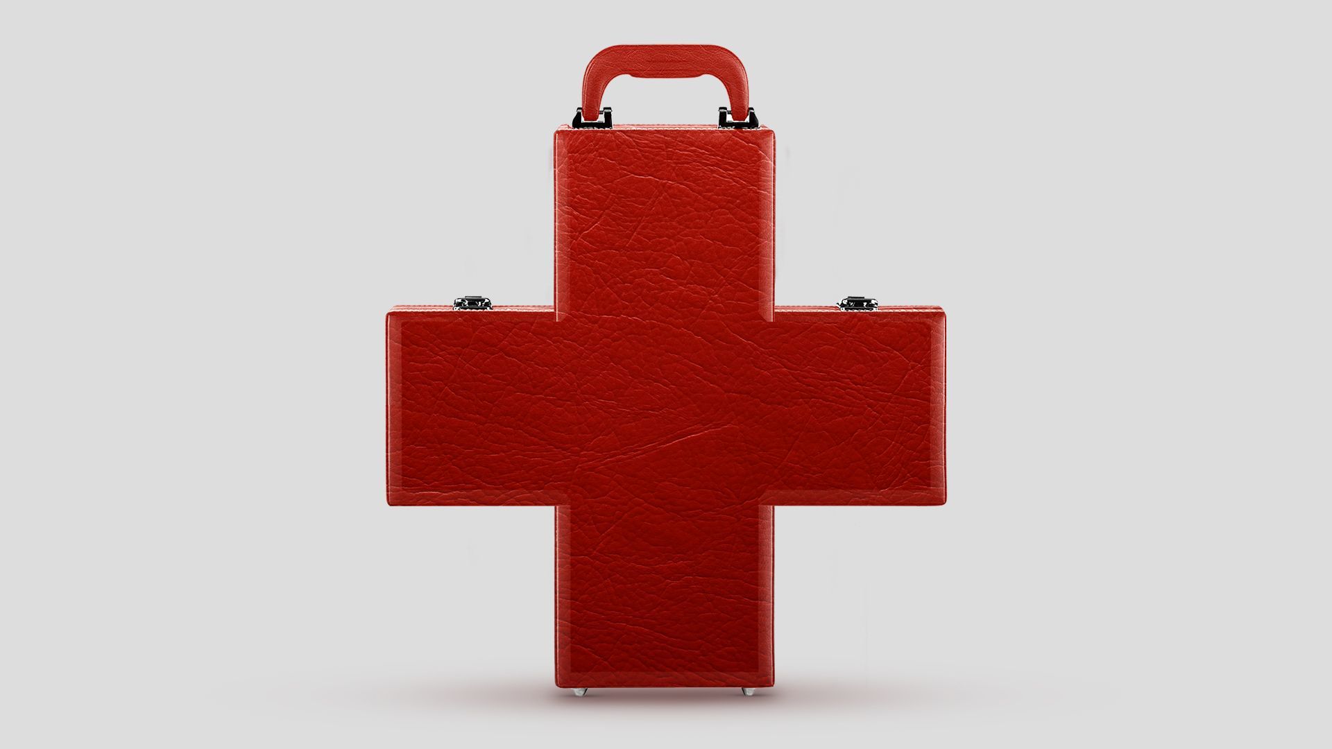 Illustration of a briefcase shaped like a red cross