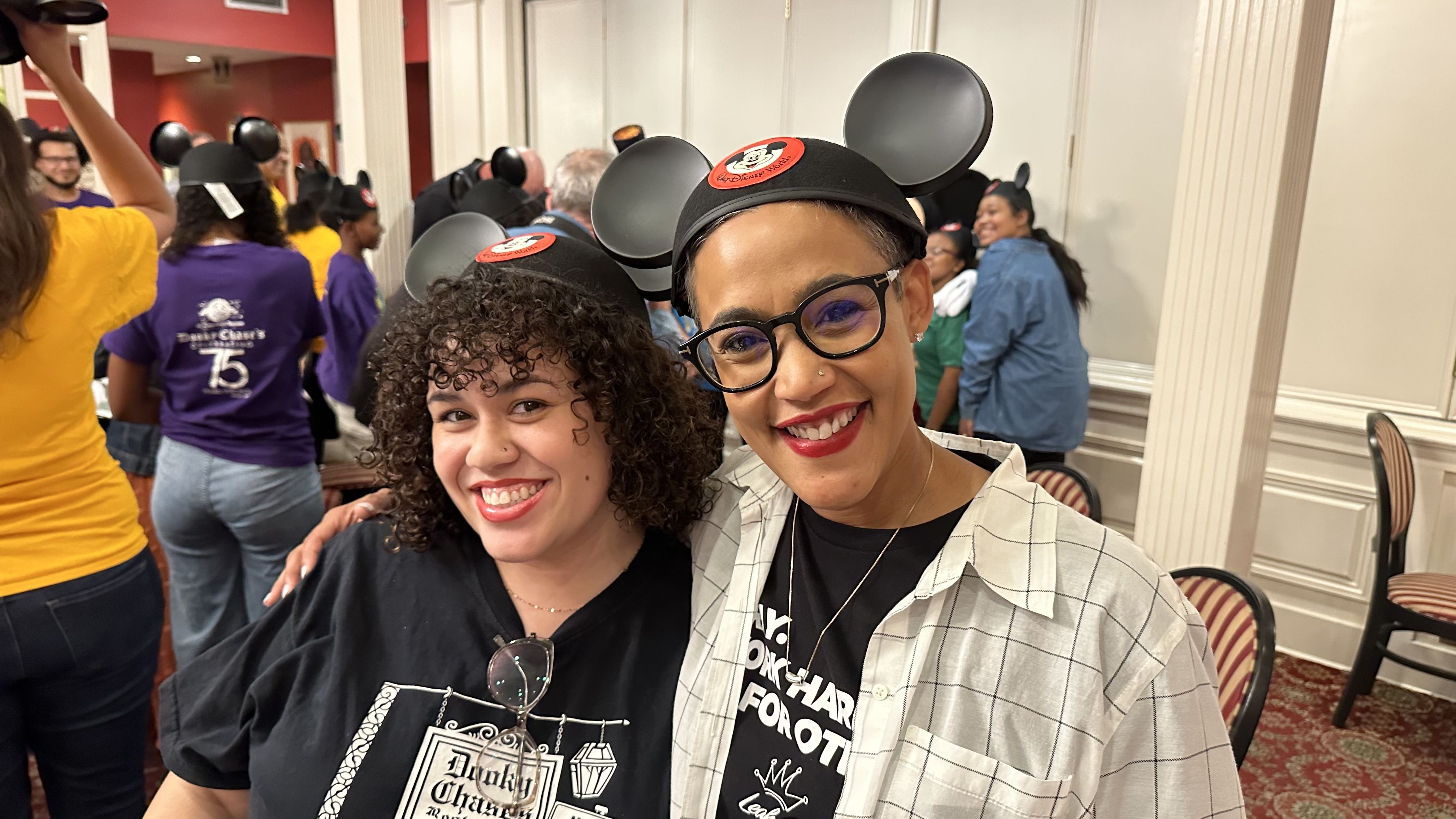 Photo shows Chase family members in Mickey hats.