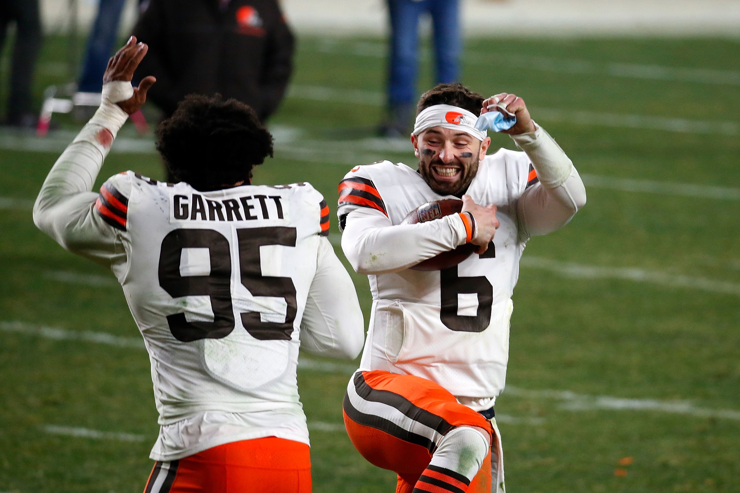 Browns players Myles Garrett and Baker Mayfield celebrate a win.