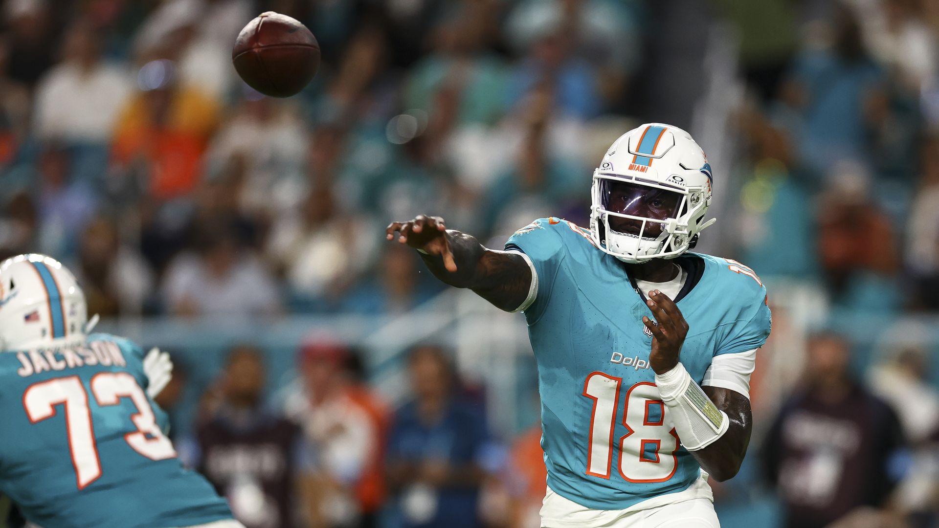 Tyler Huntley #18 of the Miami Dolphins throws a pass during the second quarter against the Tennessee Titans at Hard Rock Stadium on September 30, 2024 in Miami Gardens, Florida.