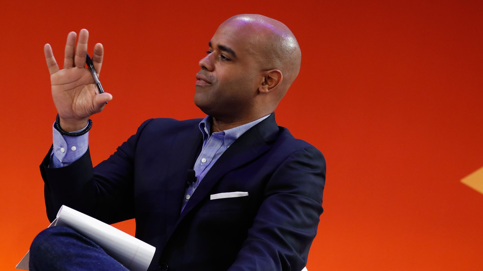 Jamal Simmons is seen speaking at a public event.