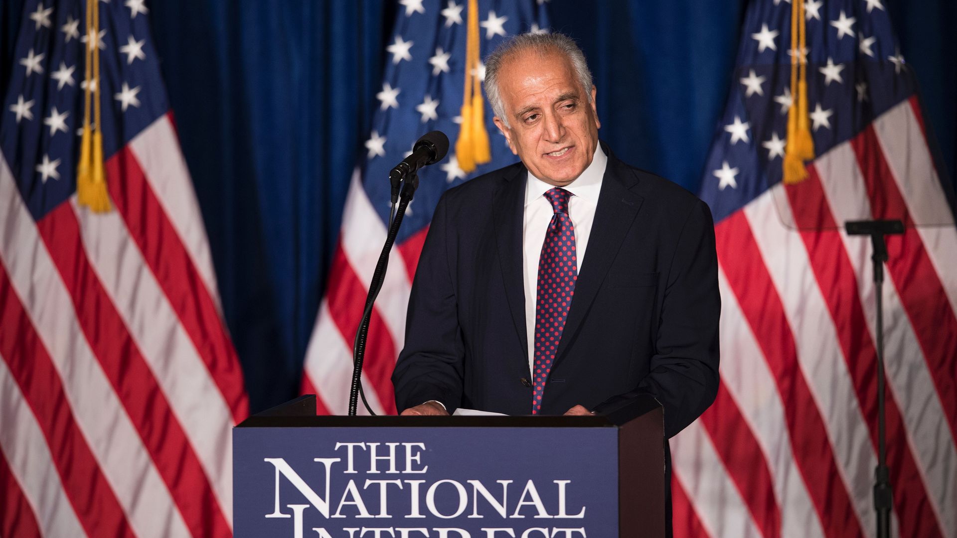 Former US Ambassador to Afghanistan Zalmay Khalilzad speaks before Republican US Presidential hopeful Donald Trump speaks about foreign policy
