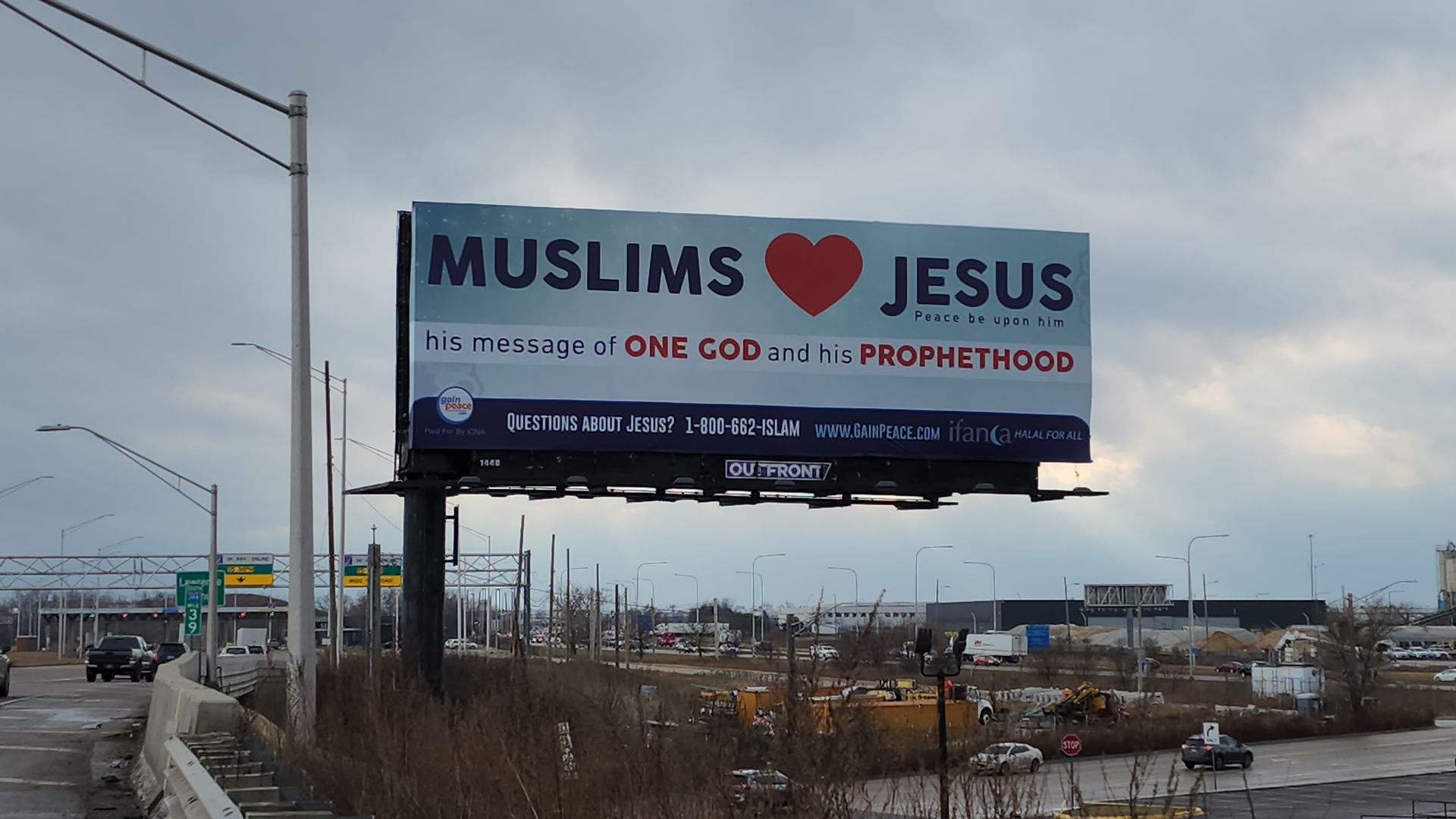 Photo of a billboard that says "Muslims loves Jesus"