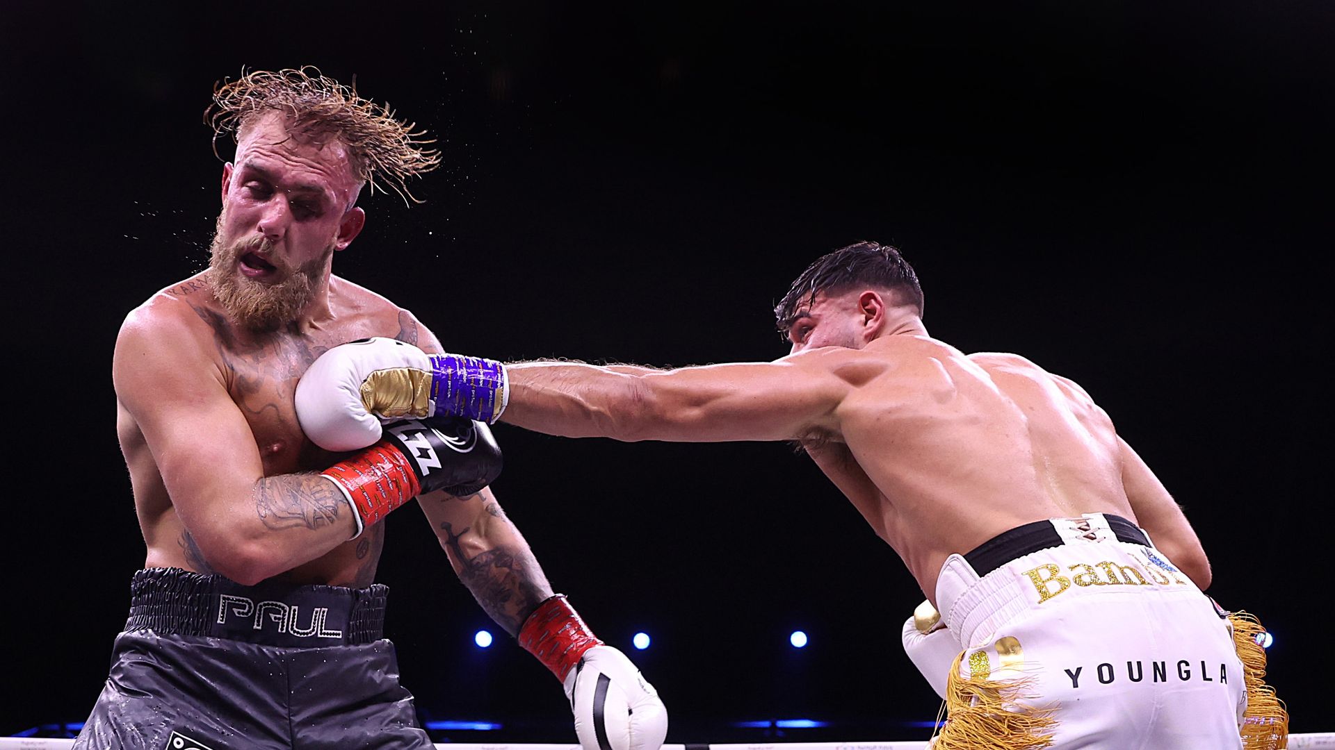 Boxer Jake Paul takes a massive left jab from Tommy Fury.