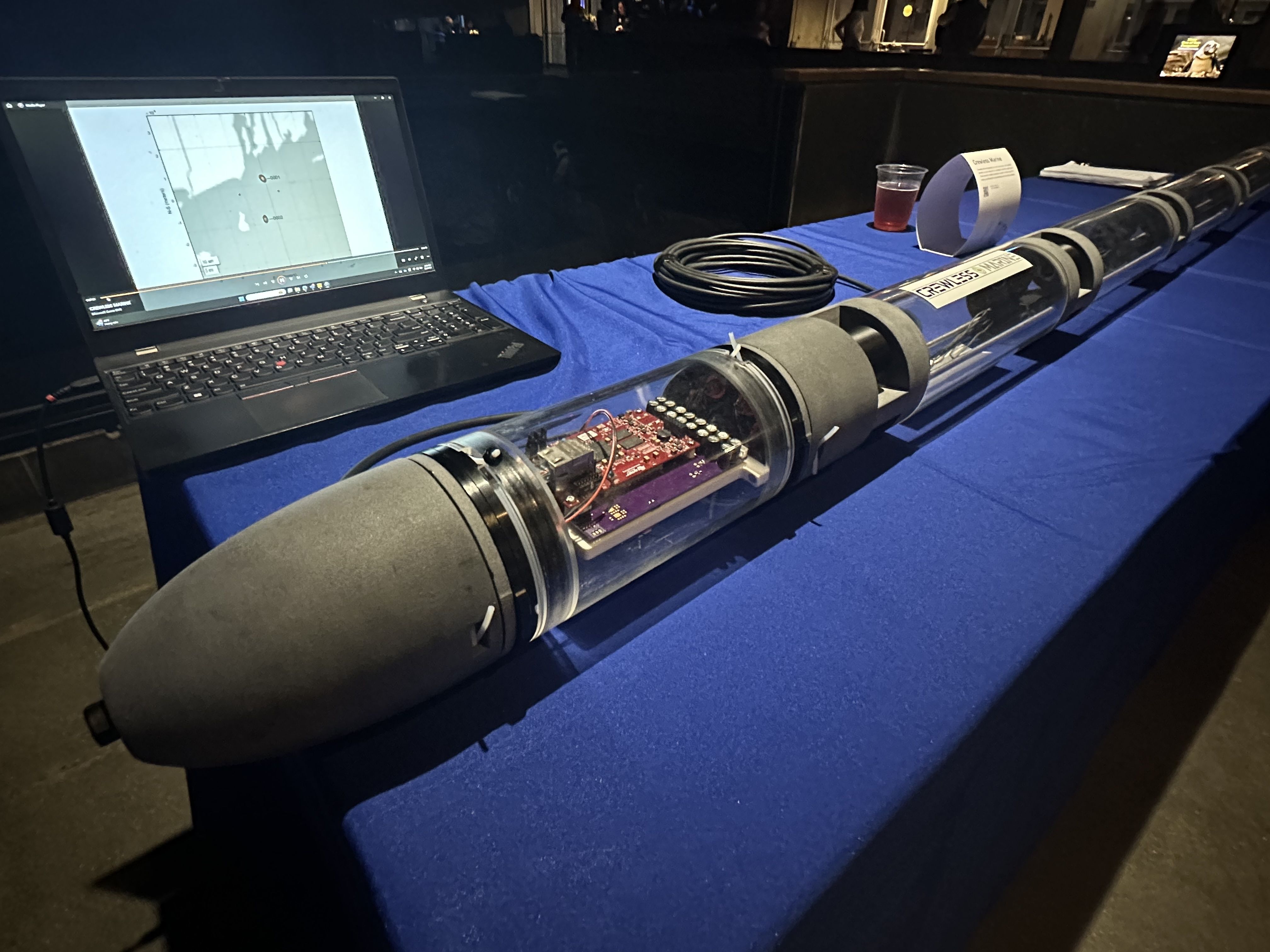 A long device the size of a long table with accoustic sensors presented at BlueSwell's Demo Day.