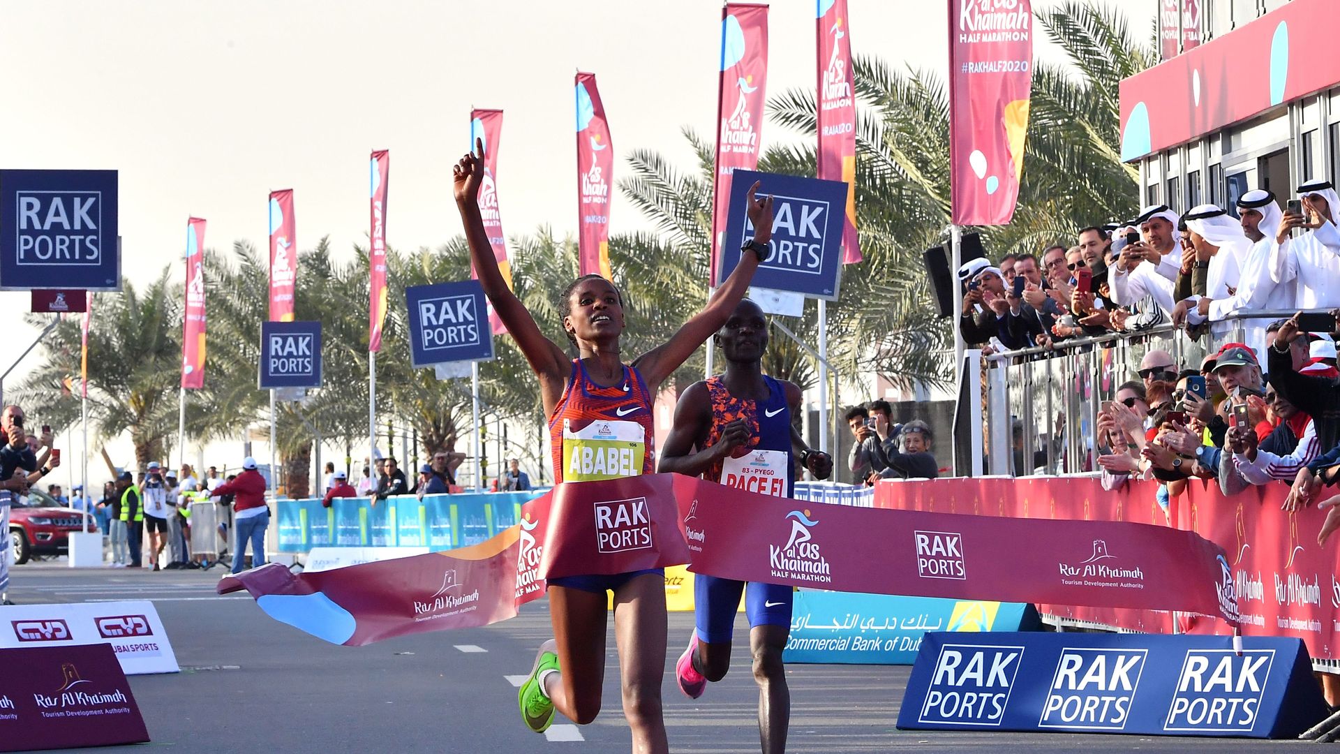 Ababel Yeshaneh crosses the finish line of RAK Half Marathon 