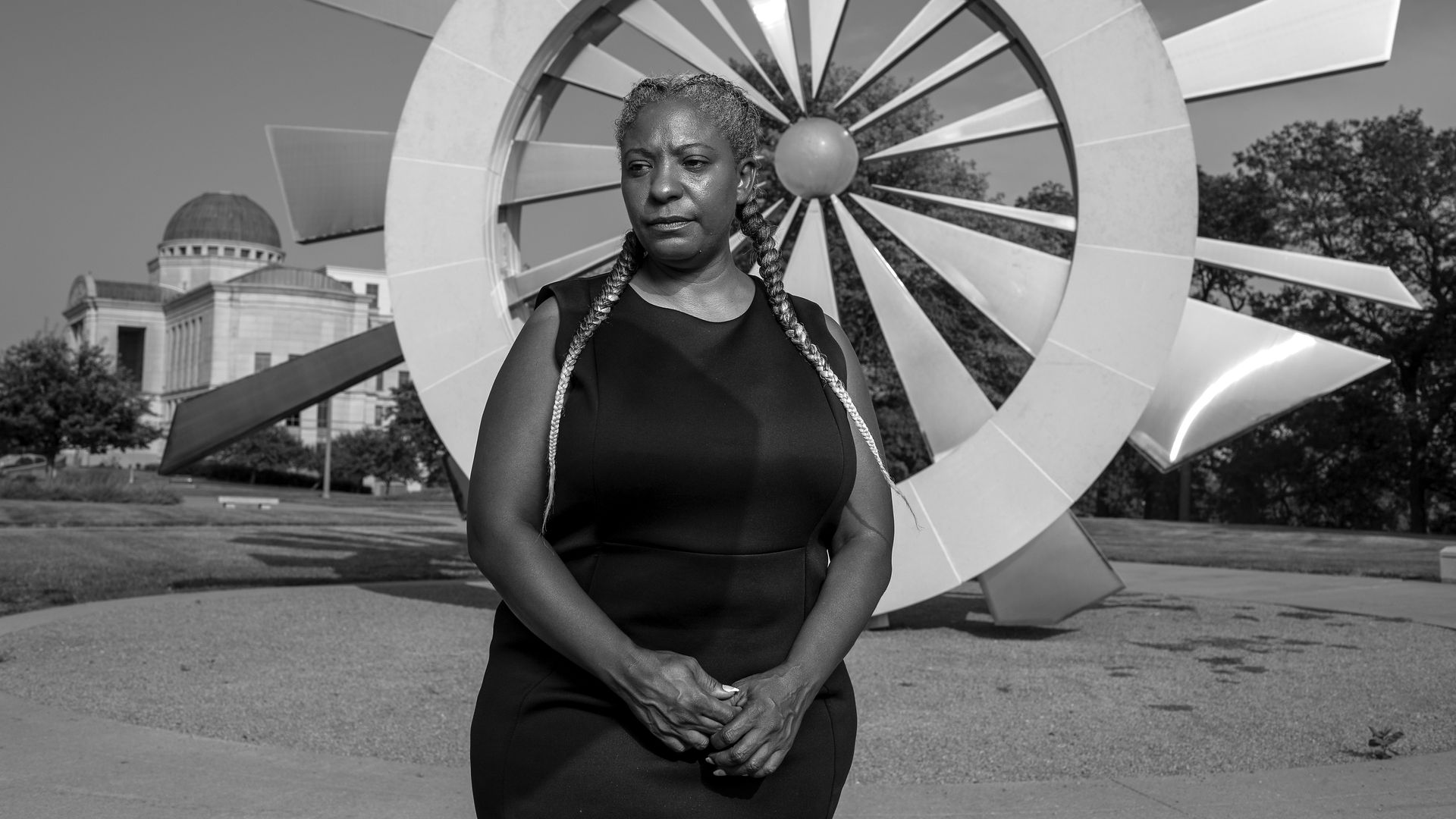 A woman in front of the civil rights monument