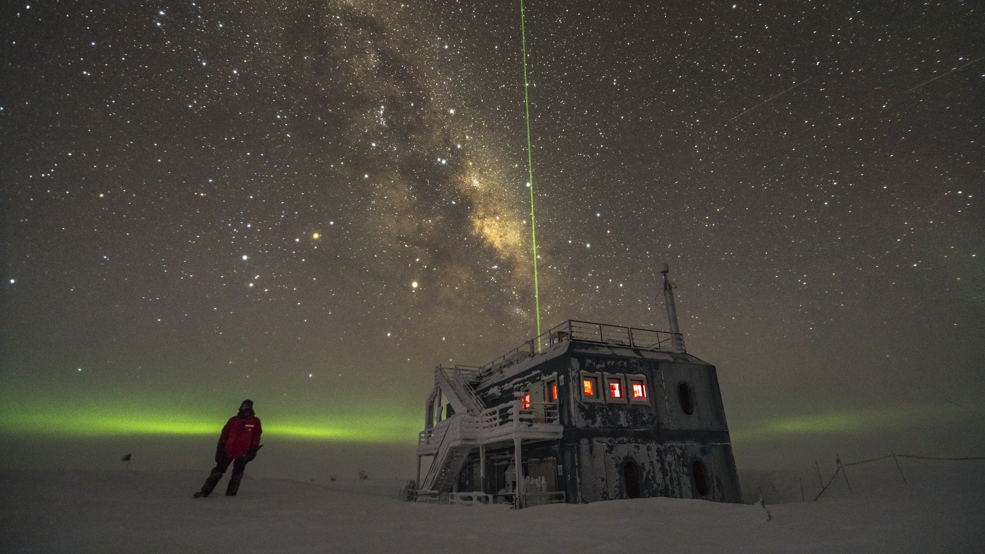 IceCube lab in Antarctica under the stars.