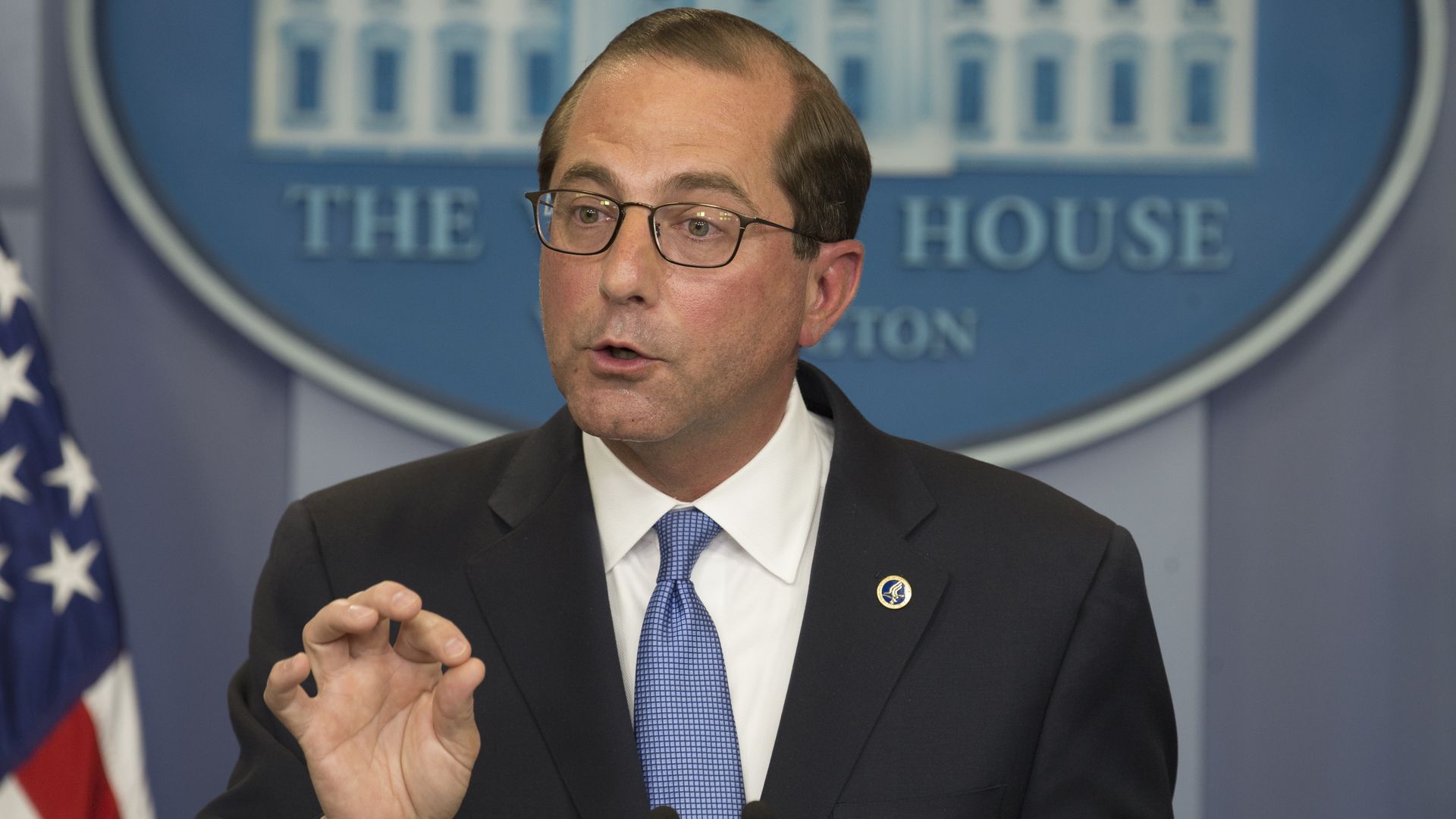 HHS Secretary Alex Azar briefs reporters at the White House.