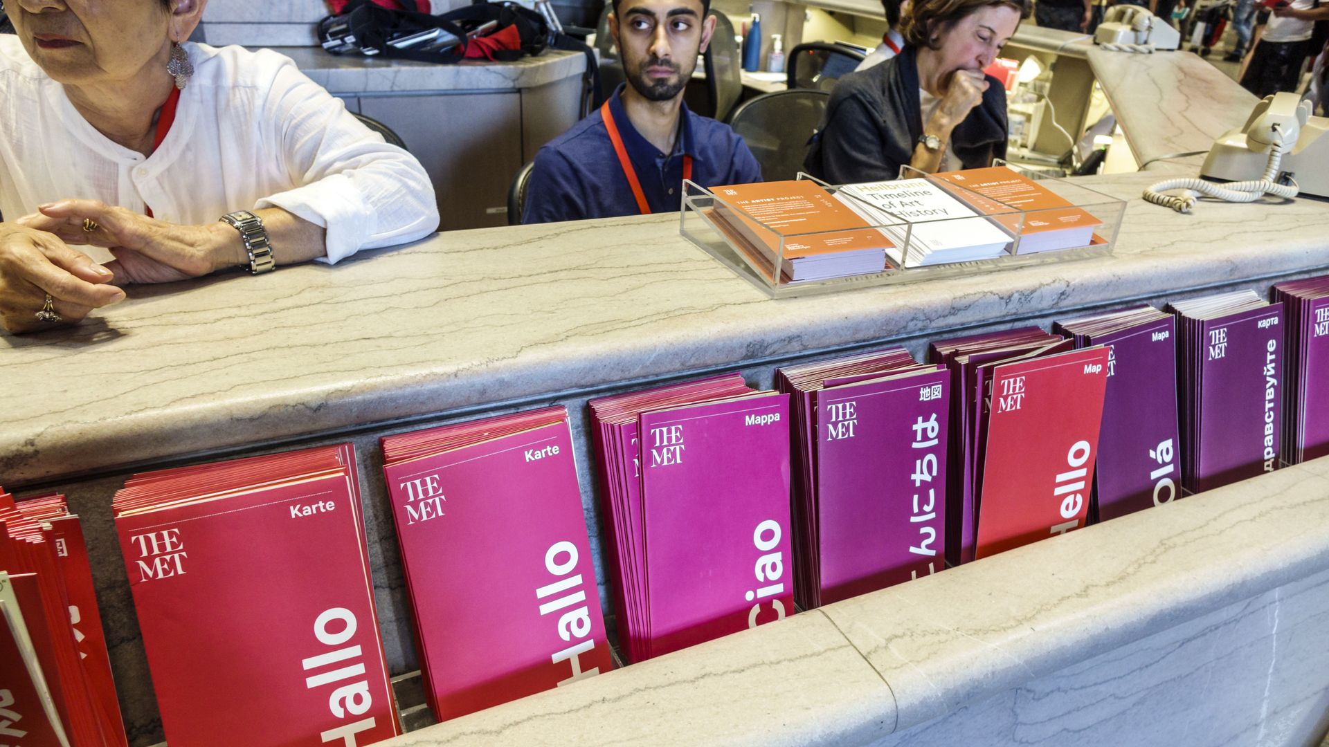 A photo of museum brochures in various languages