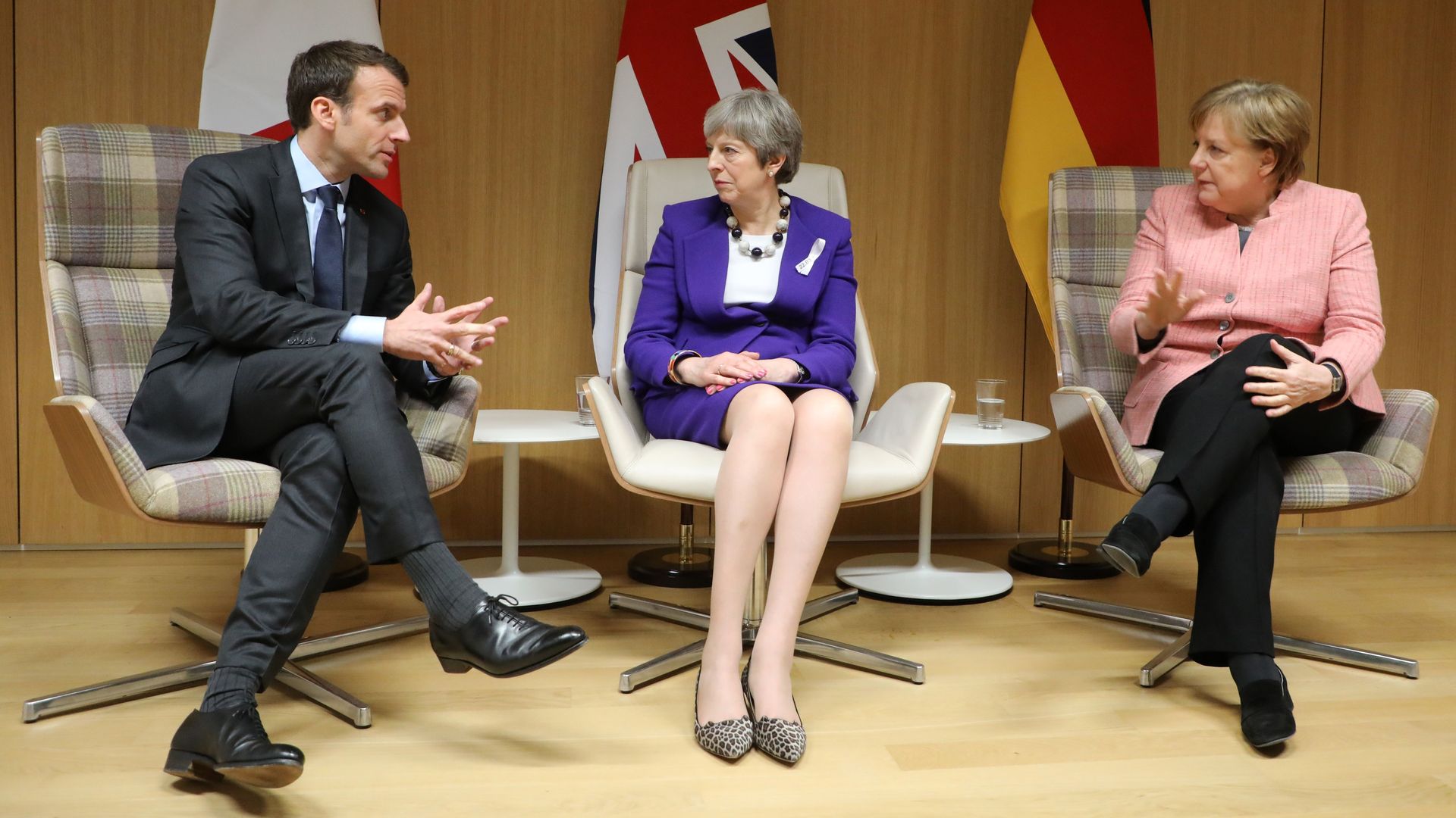 Theresa May, Angela Merkel and Emmanuel Macron following a meeting on the sidelines of the European Union leaders summit in Brussels
