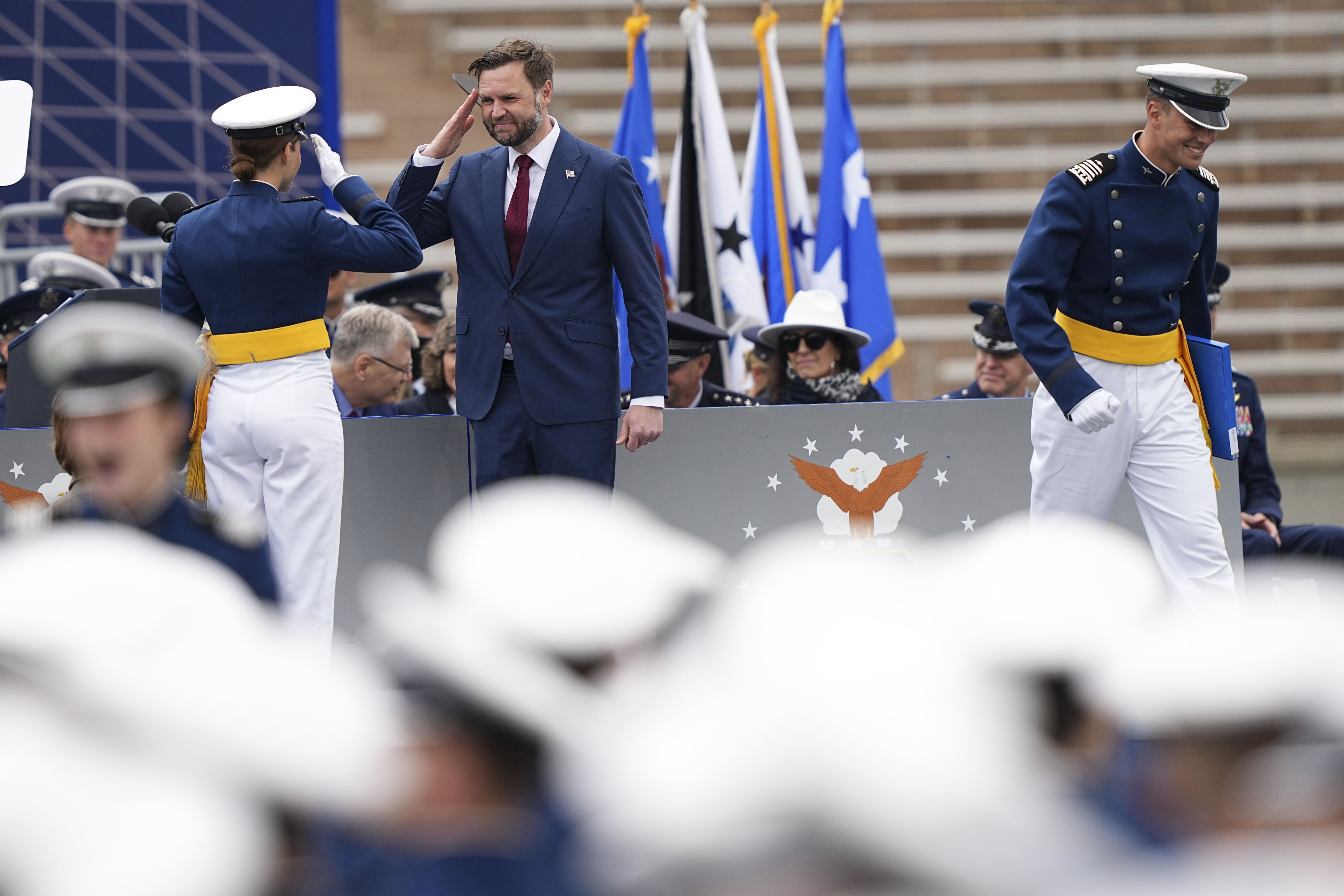 Vice President JD Vance salutes a graduating cadet at the U.S. Air Force Academy today. Photo: Matt Rourke-Pool/Getty Images
