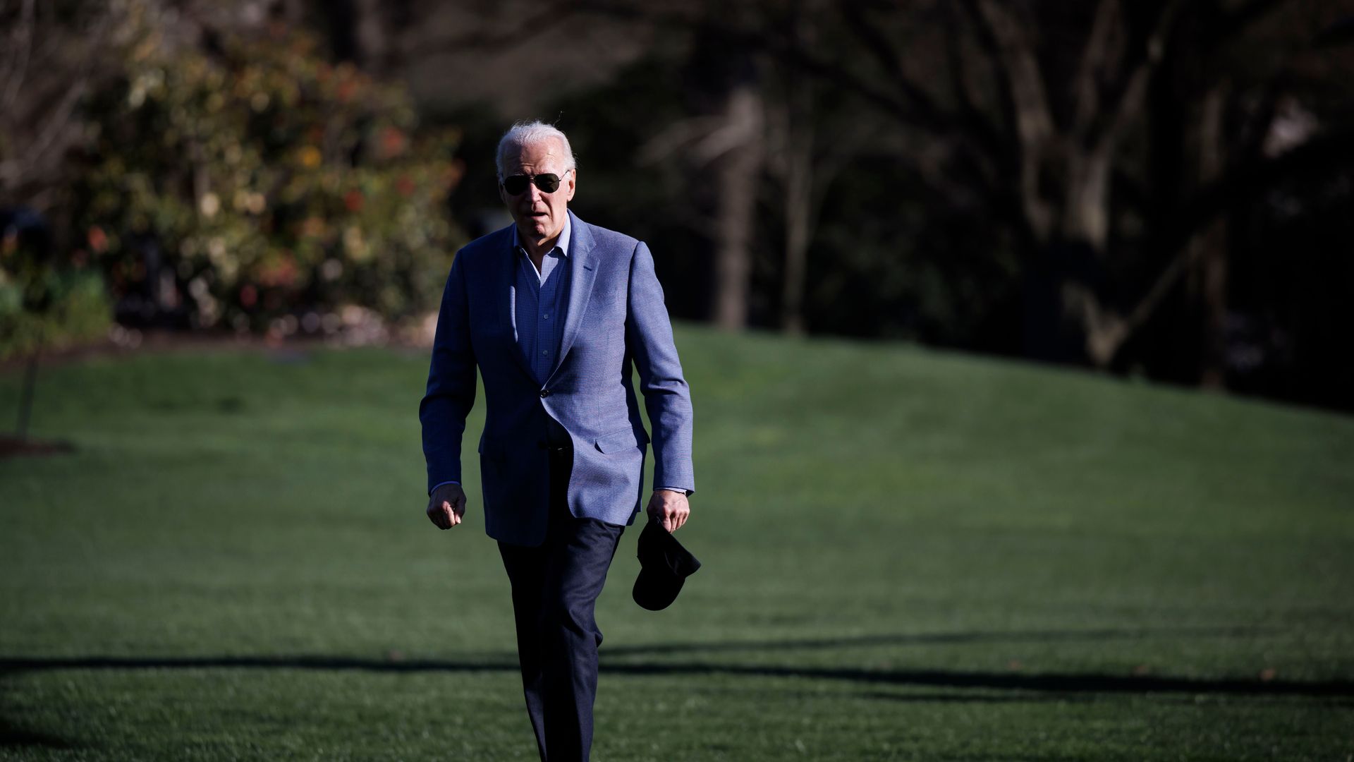 US President Joe Biden walks on the South Lawn of the White House after arriving on Marine One in Washington, DC, US, on Sunday, March 24, 2024.