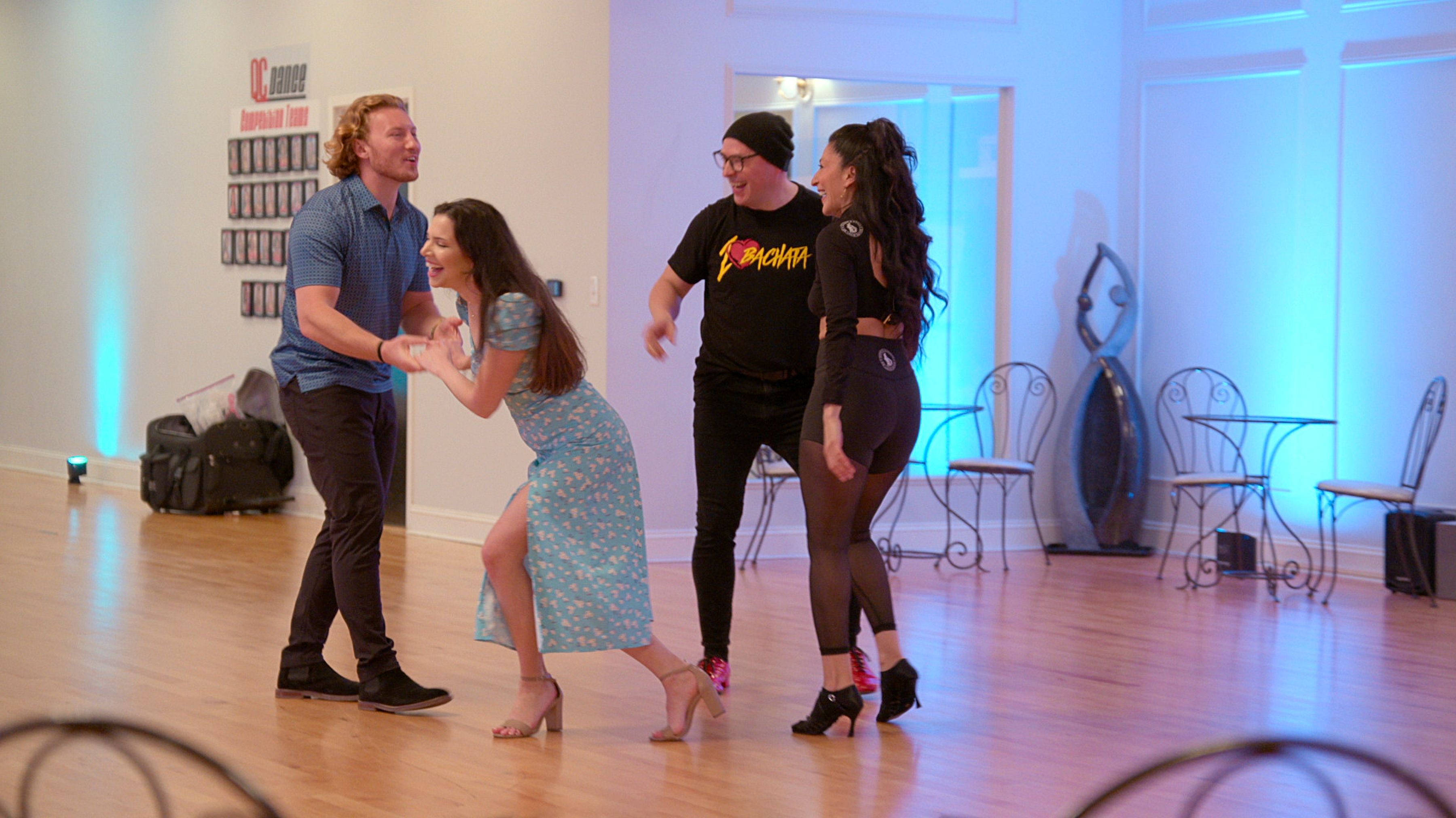 four people in a dance studio