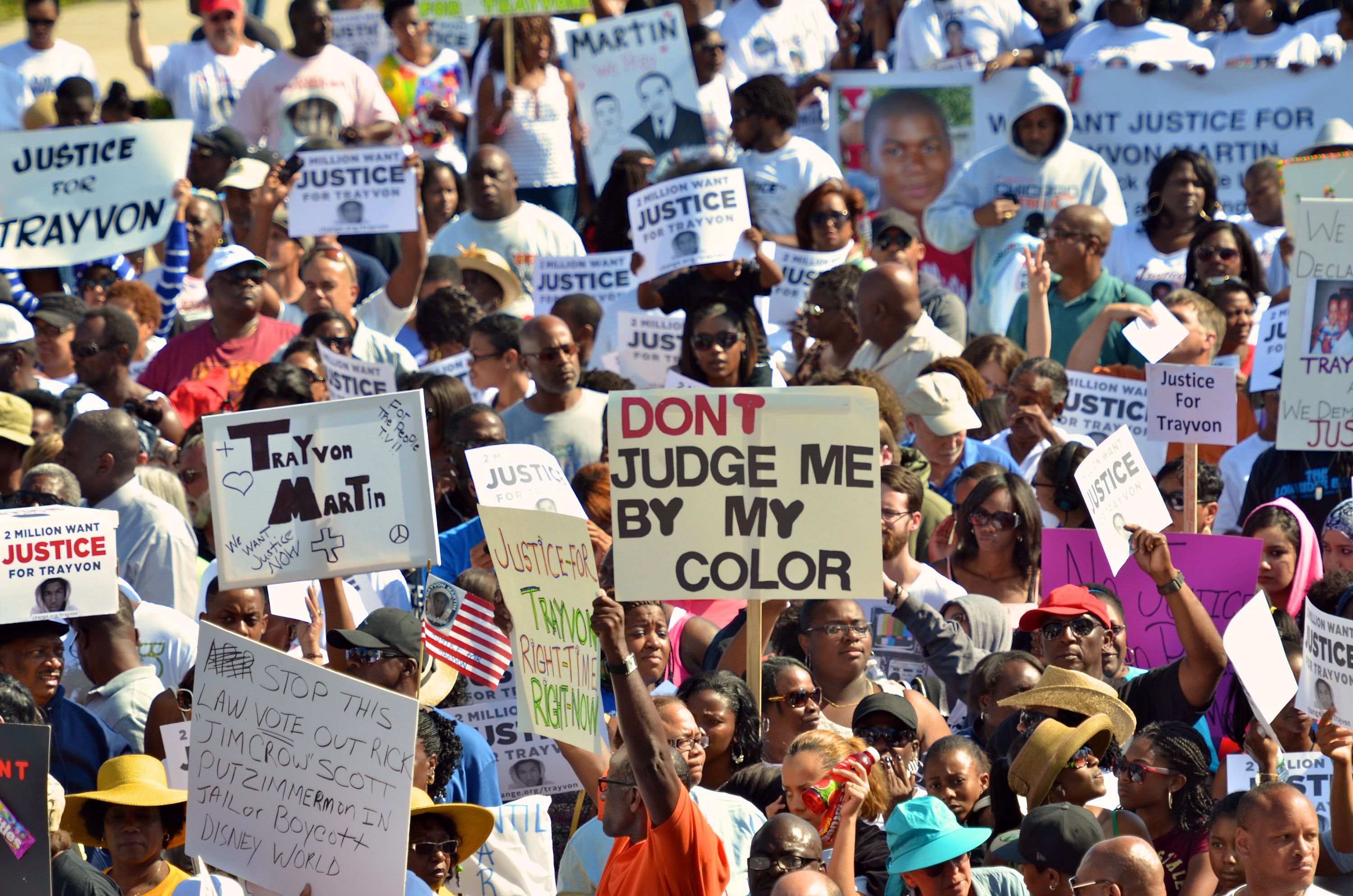 Thousands of protestors march through the streets in support of slain teenager Trayvon Martin on March 26, 2012 in Sanford, Florida. 