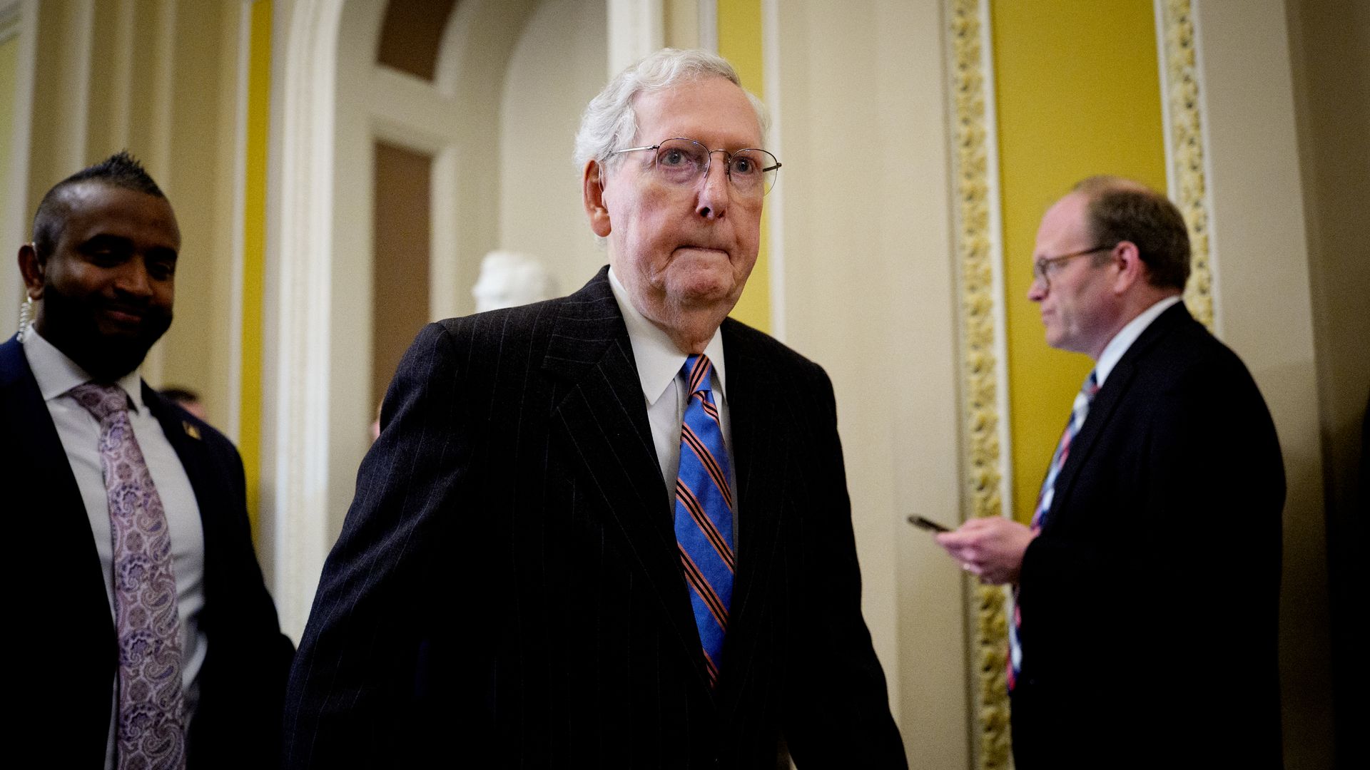 Mitch McConnell walking in the U.S. Capitol