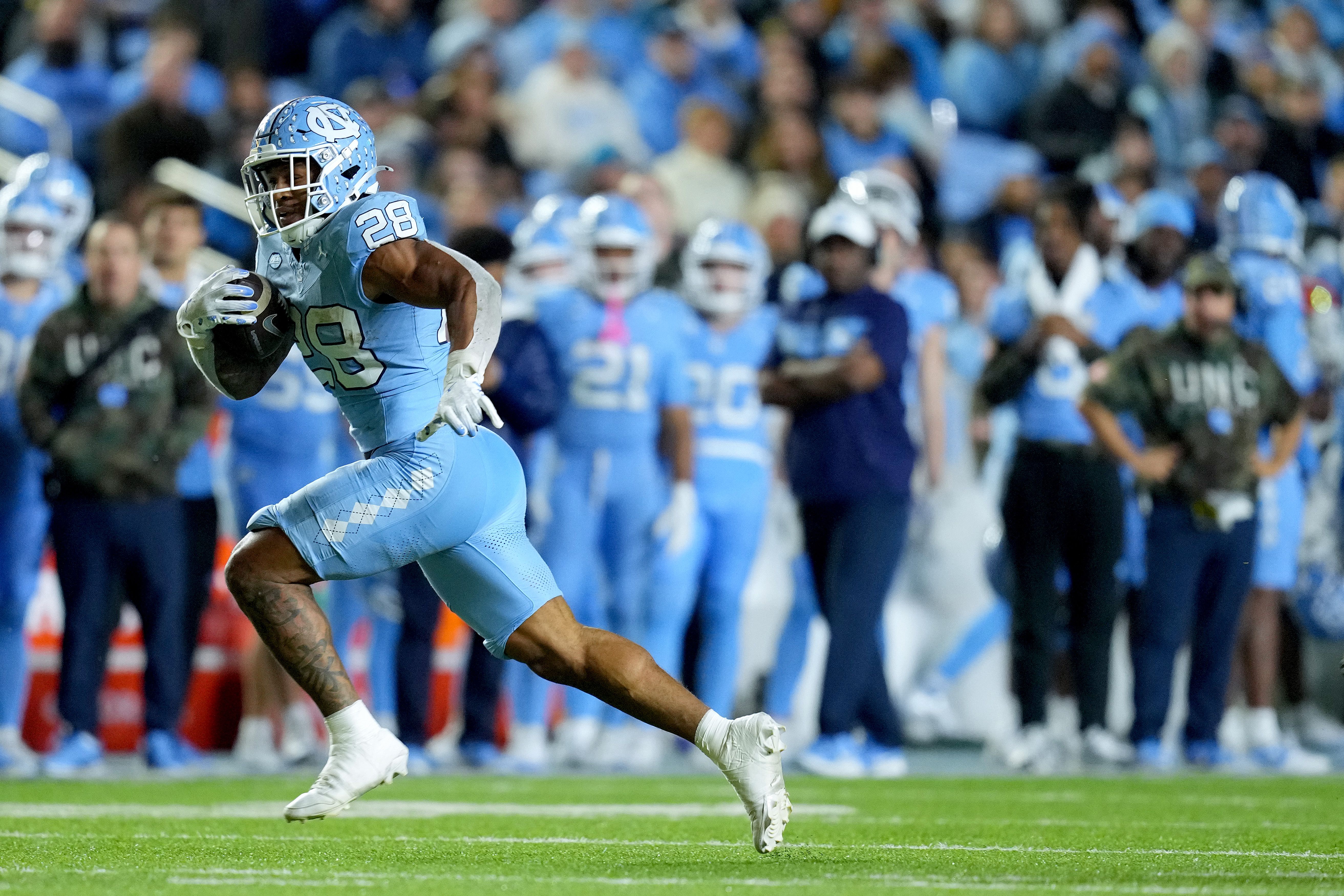Omarion Hampton #28 of the North Carolina Tar Heels runs against the Wake Forest Demon Deacons during the game at Kenan Memorial Stadium on November 16, 2024 in Chapel Hill, North Carolina. (Photo by Grant Halverson/Getty Images)