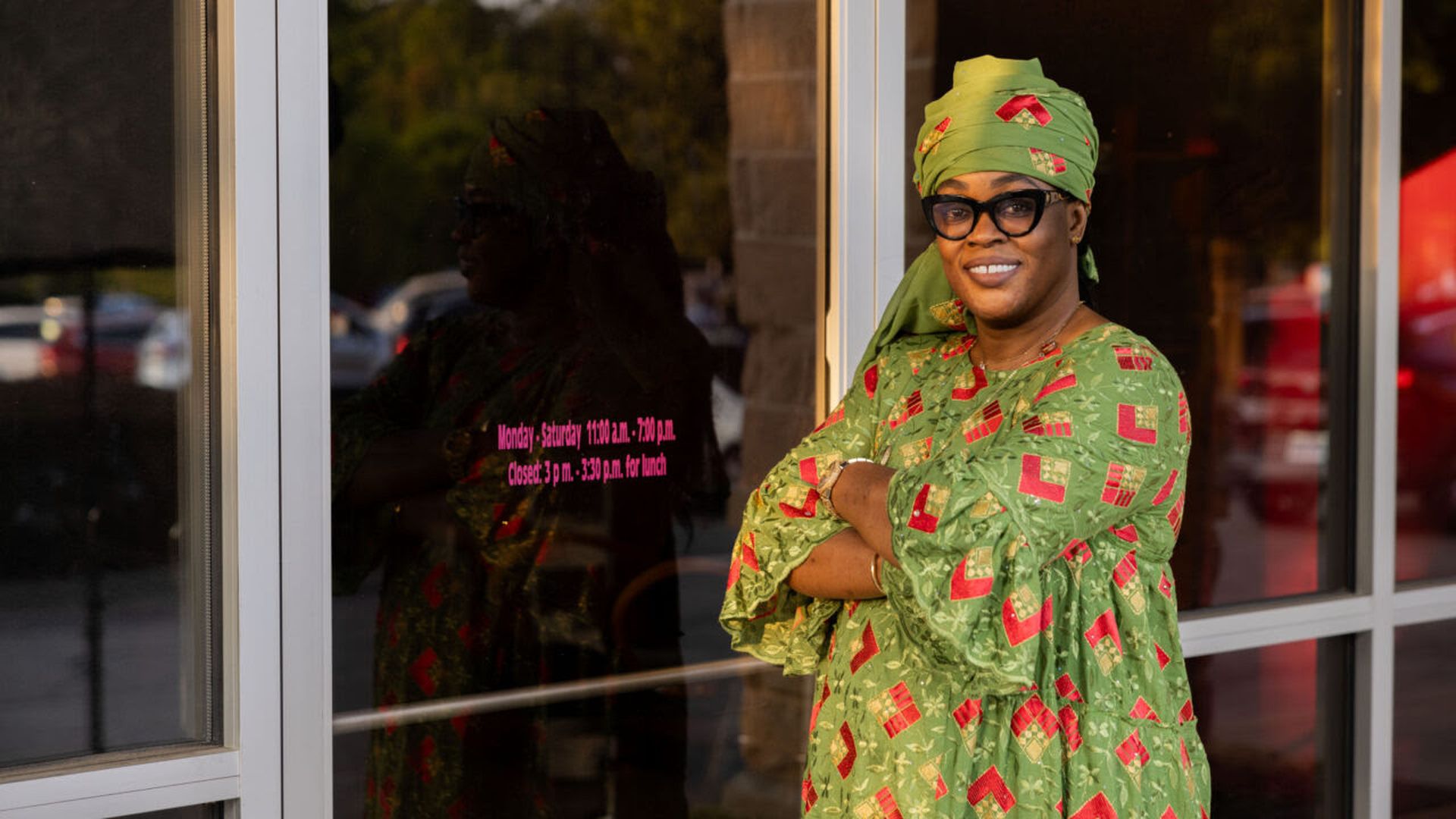 Awa Diagne stands in front of the storefront where she wants to open her African braiding shop.