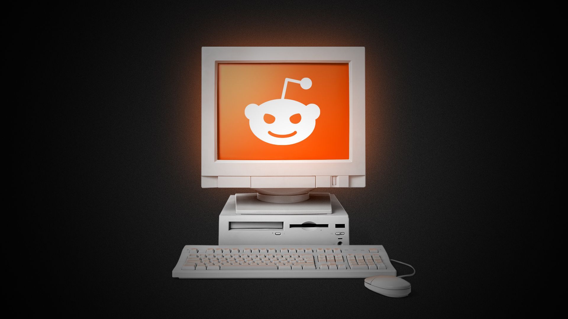 Illustration of a glowing computer in the dark with the Reddit Alien on screen looking menacing.